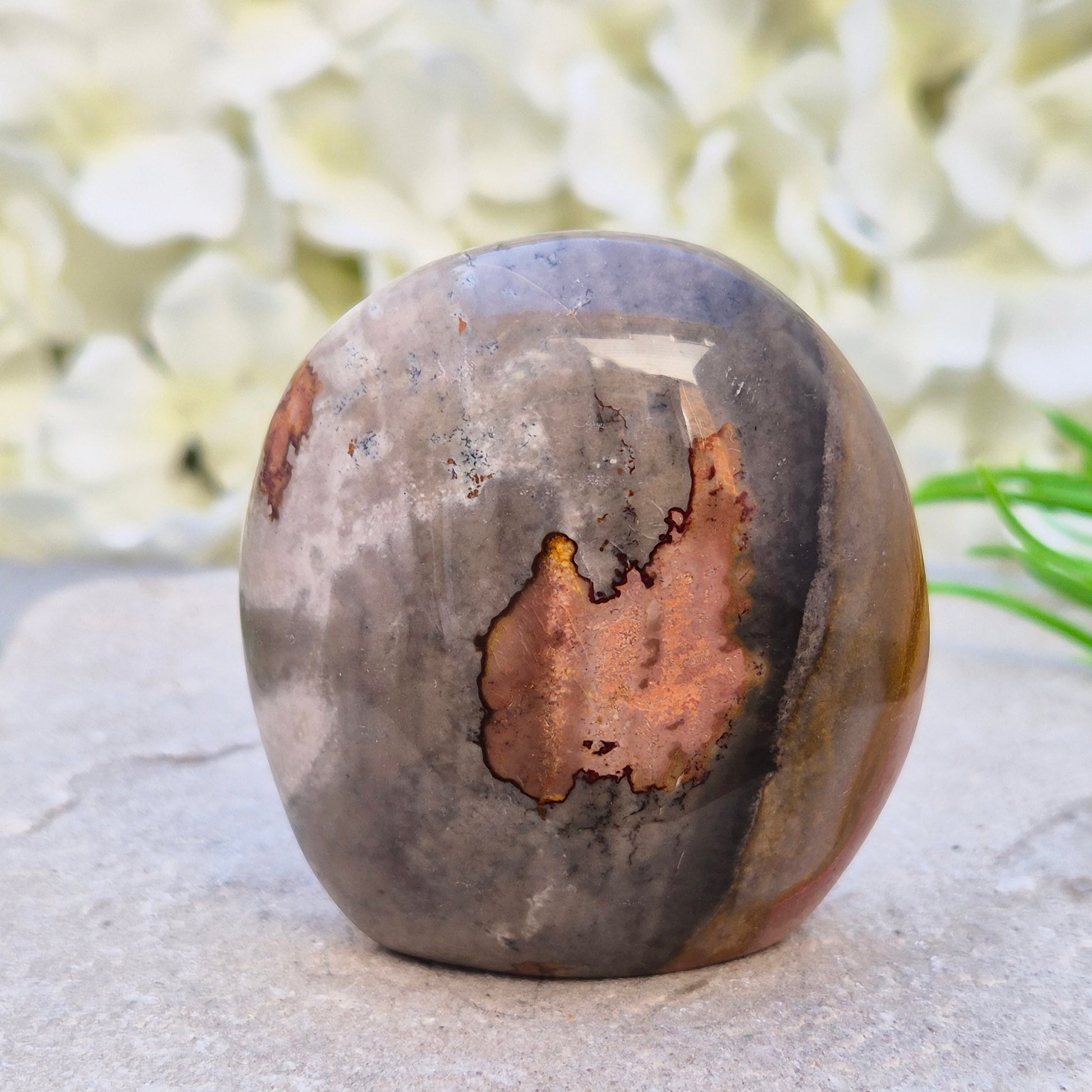 Polychrome Jasper freeform from Madagascar. Polished stone with earthy tones for grounding, stability, and balanced everyday energy.