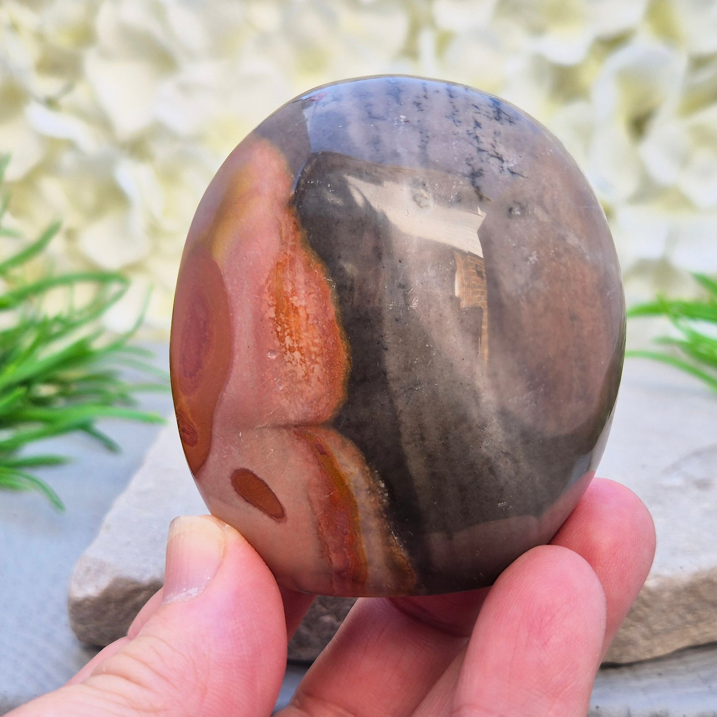 Polychrome Jasper freeform from Madagascar. Polished stone with earthy tones for grounding, stability, and balanced everyday energy.