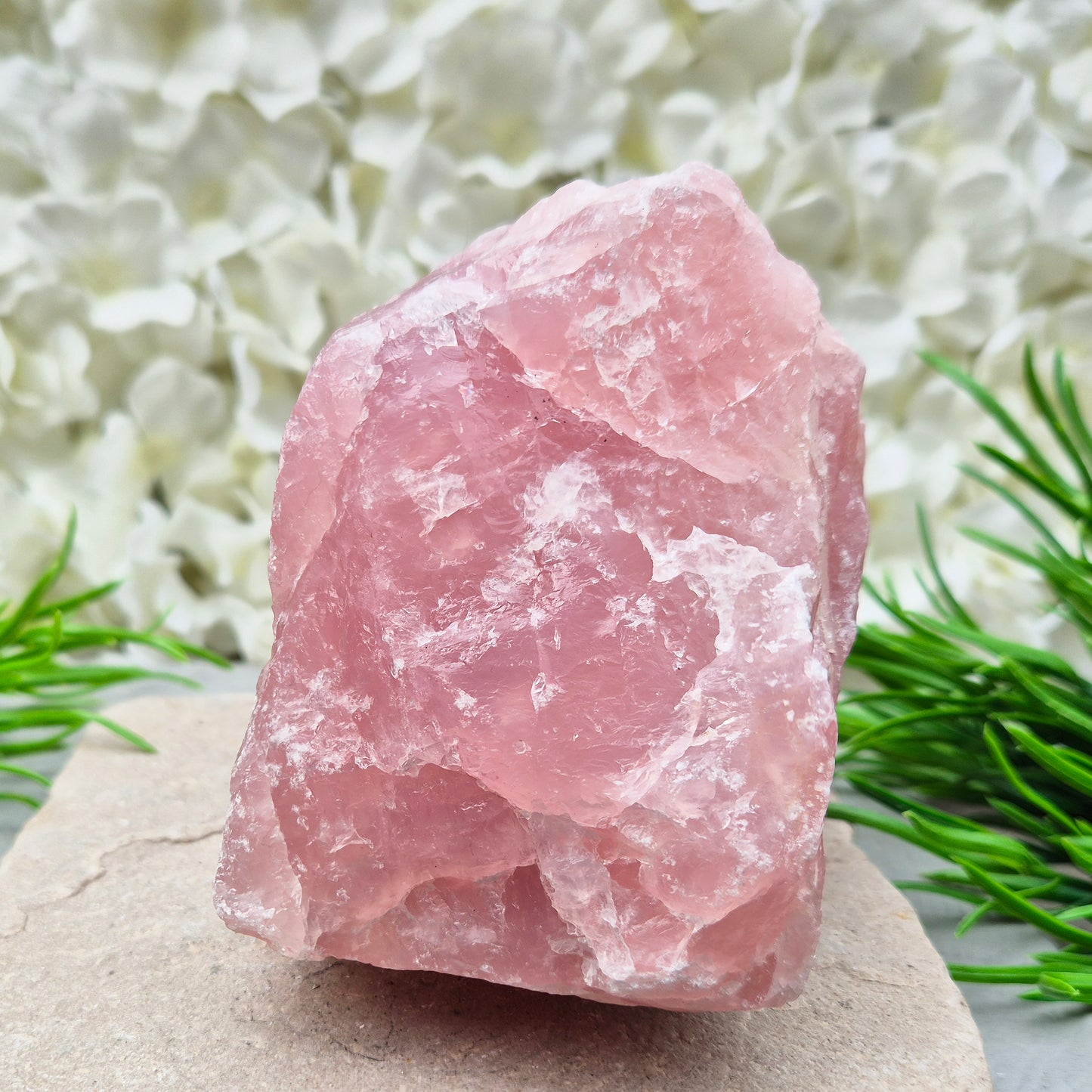 Natural Rose Quartz crystal to display in your home. Promotes calm, self-love, and emotional balance while bringing harmony to your space.