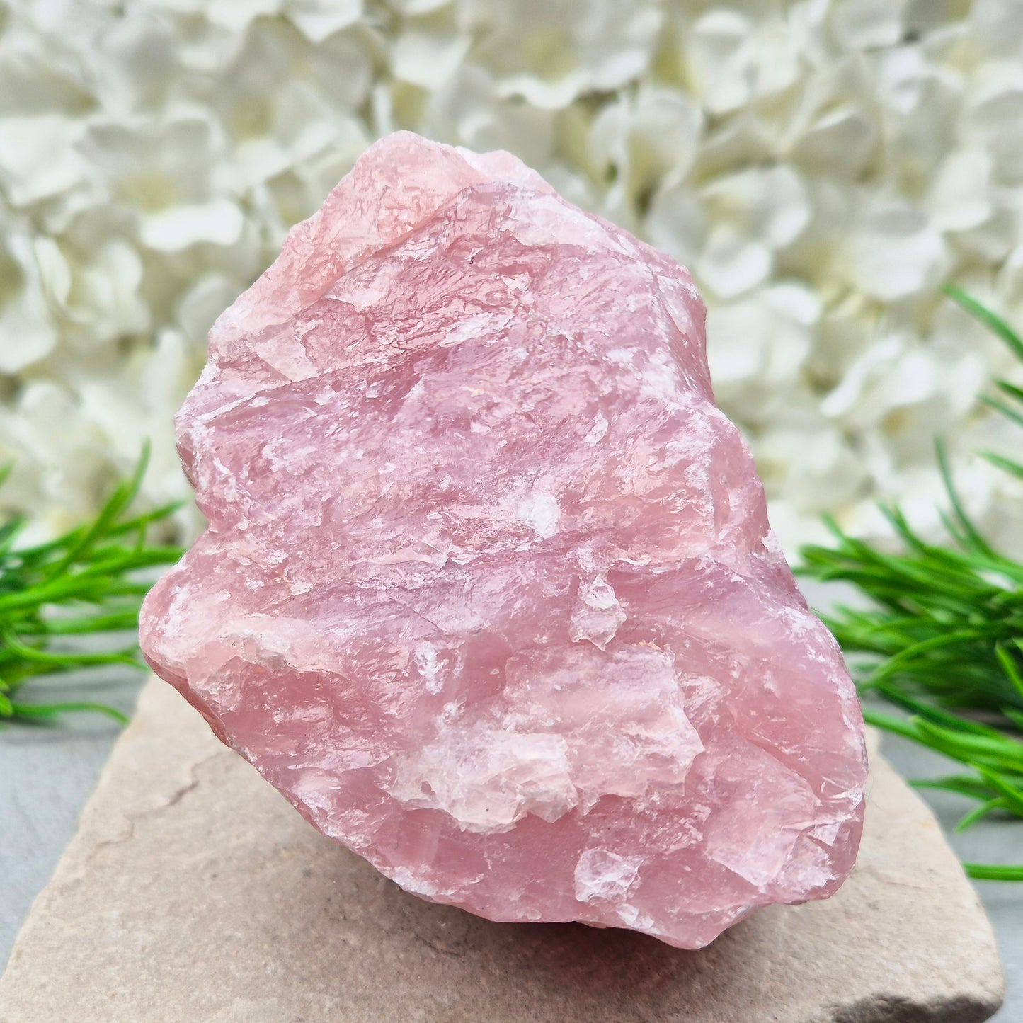 Natural Rose Quartz crystal to display in your home. Promotes calm, self-love, and emotional balance while bringing harmony to your space.
