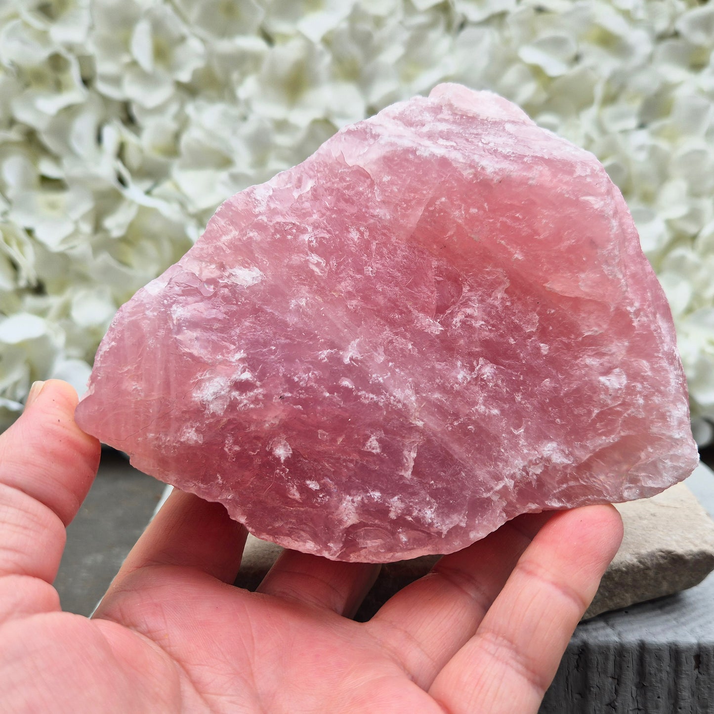 Natural Rose Quartz crystal to display in your home. Promotes calm, self-love, and emotional balance while bringing harmony to your space.