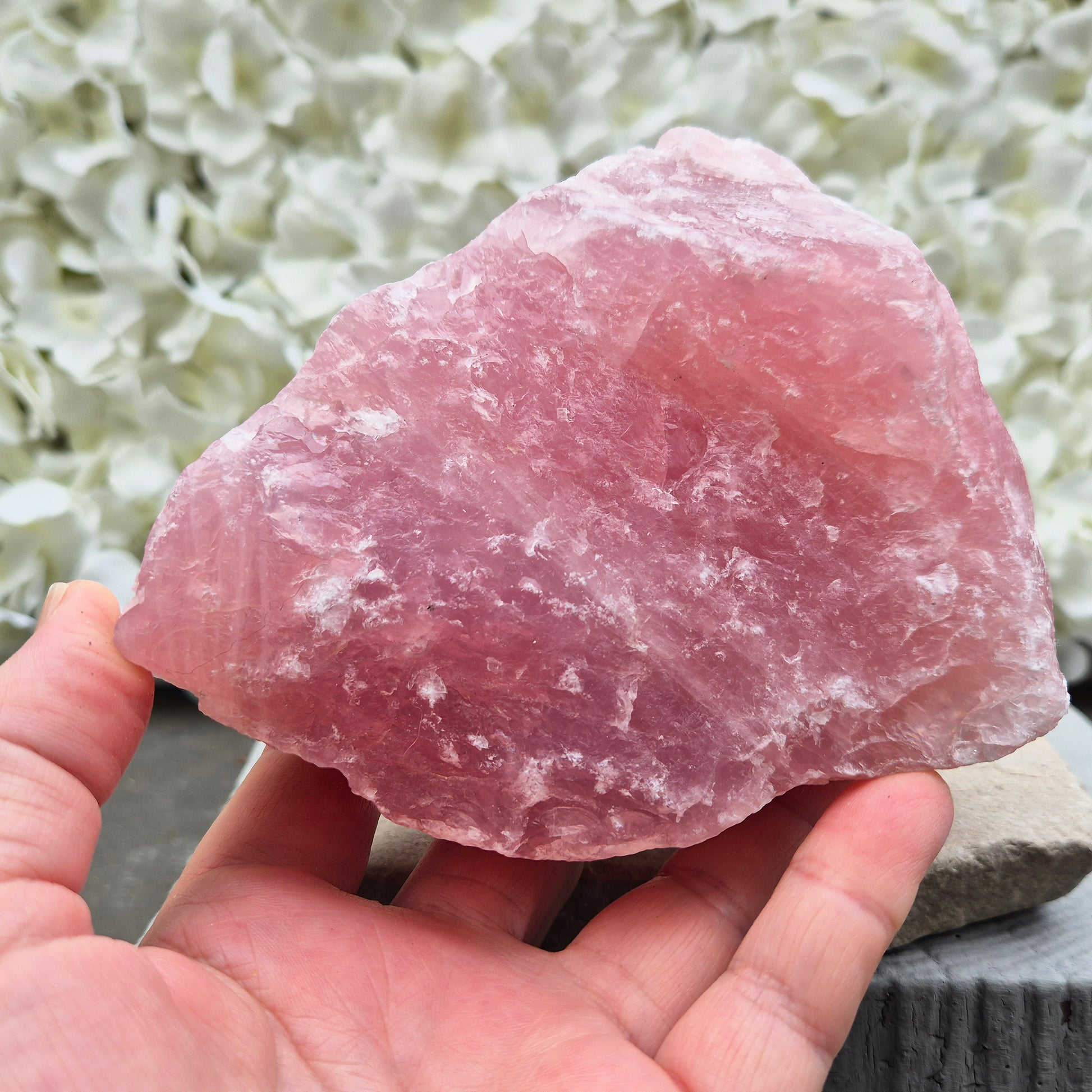 Natural Rose Quartz crystal to display in your home. Promotes calm, self-love, and emotional balance while bringing harmony to your space.