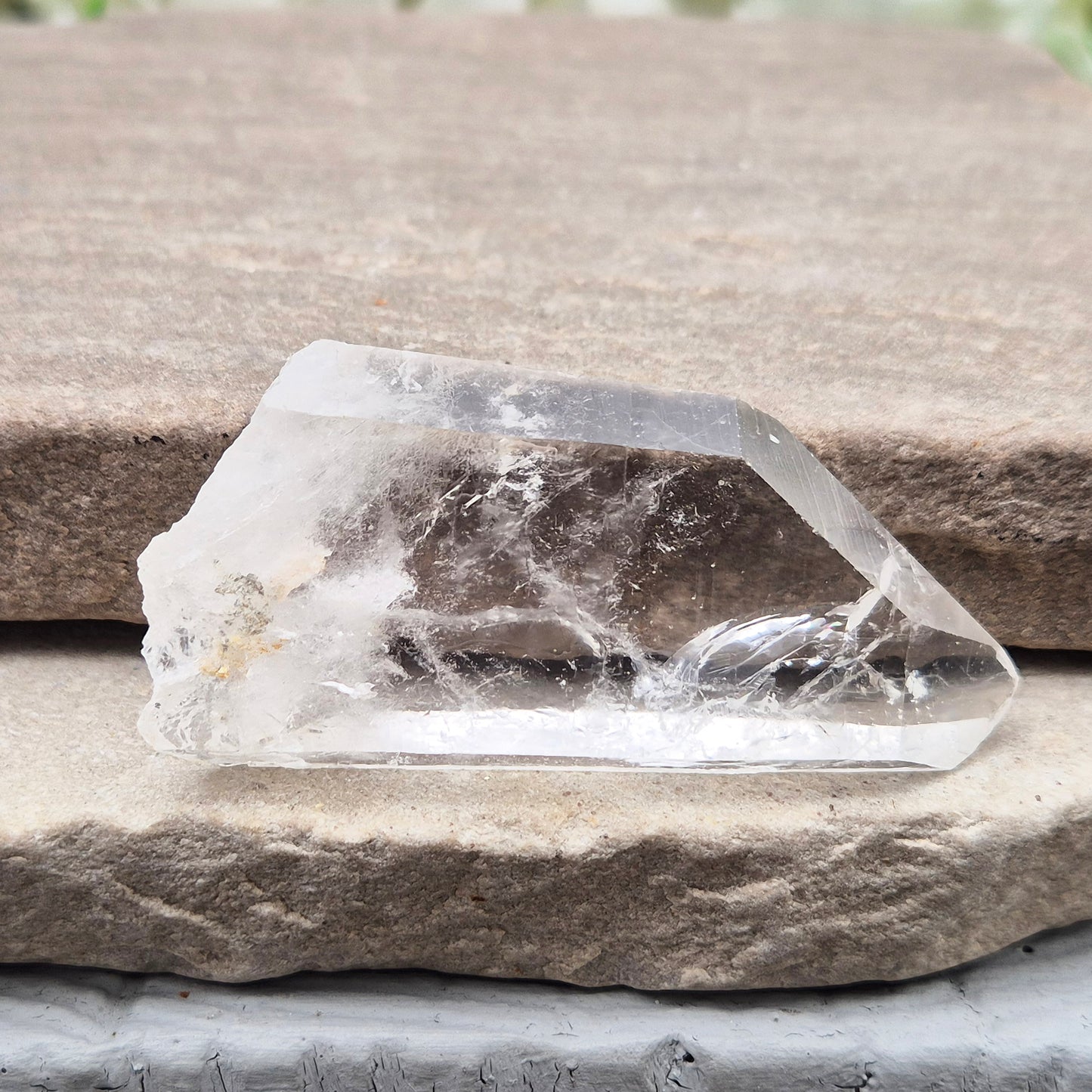 Natural Serra Quartz point from Brazil with clear, high-energy formation. Ideal for amplification, intention work, and focused spiritual practice.