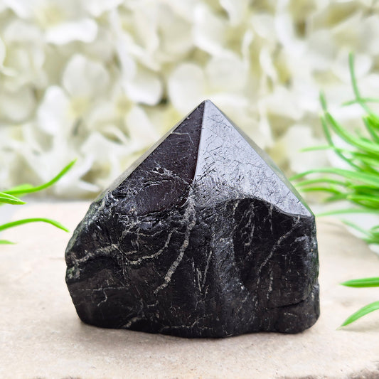 Natural Black Tourmaline standing point crystal for grounding, protection, and energy work. A powerful stone for stability, focus, and balance.