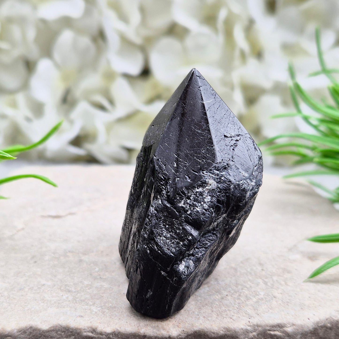 Natural Black Tourmaline standing point crystal for grounding, protection, and energy work. A powerful stone for stability, focus, and balance.
