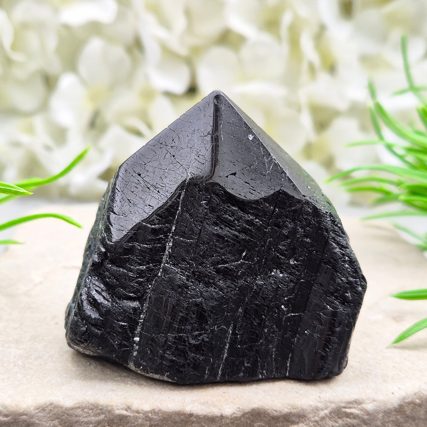 Natural Black Tourmaline standing point crystal for grounding, protection, and energy work. A powerful stone for stability, focus, and balance.