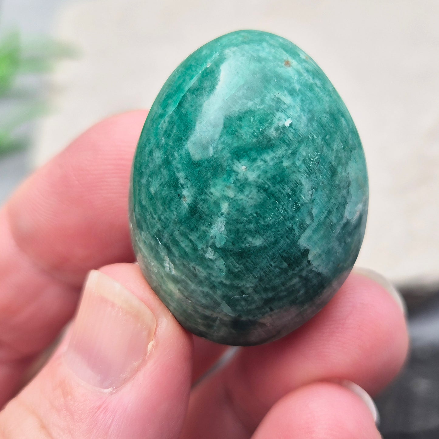 Polished Amazonite pebble shaped crystal with calming, balanced energy. Ideal for easing stress, open communication, and supportive everyday use.