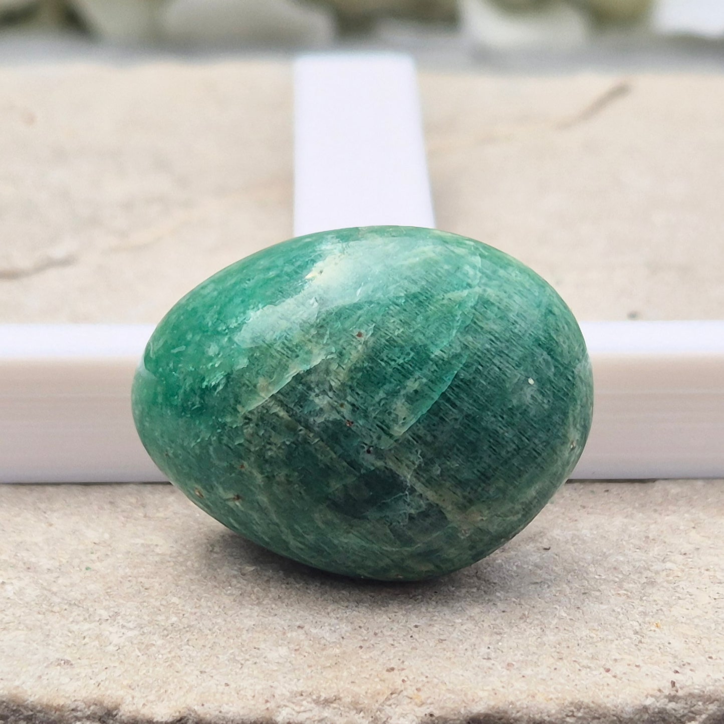 Polished Amazonite pebble shaped crystal with calming, balanced energy. Ideal for easing stress, open communication, and supportive everyday use.
