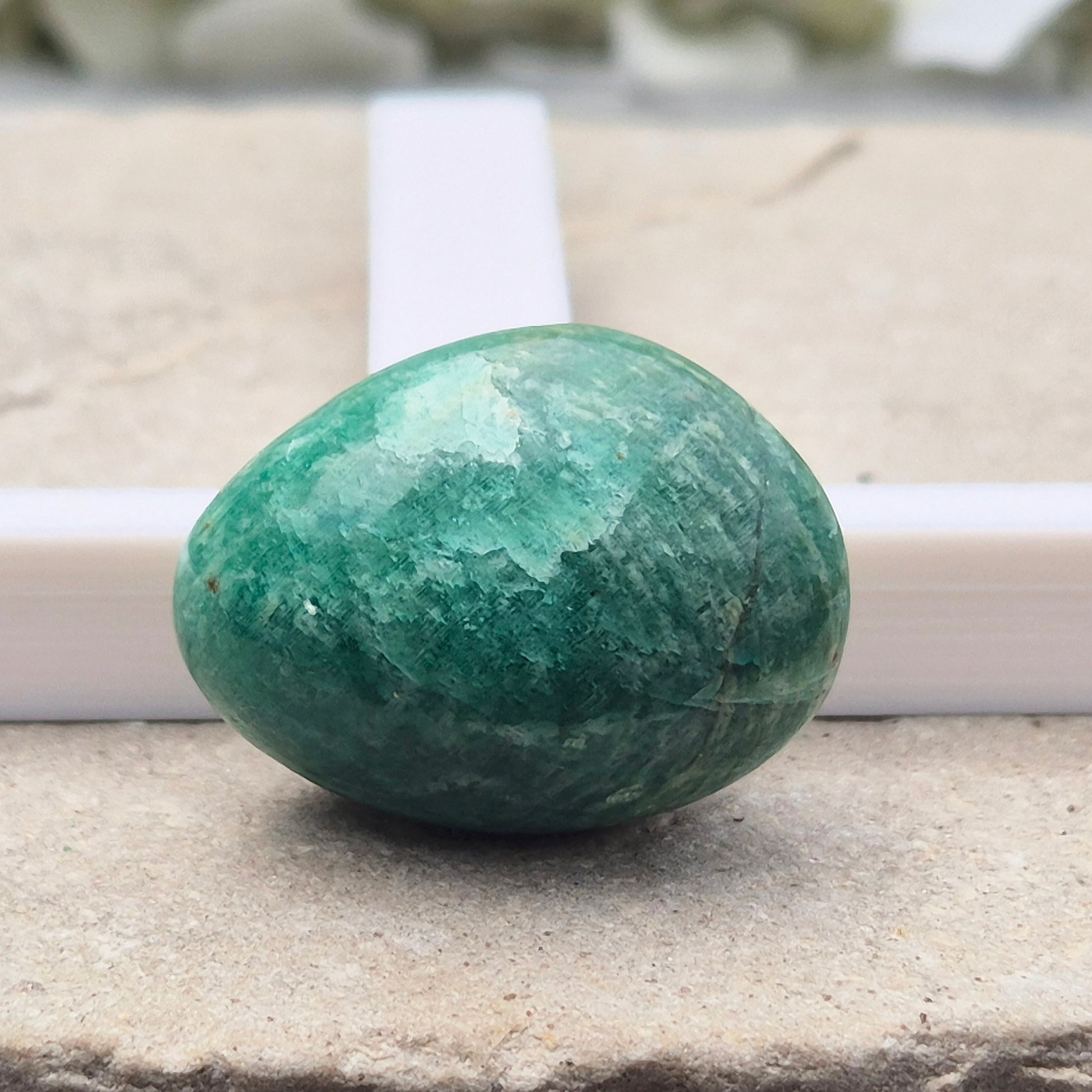 Polished Amazonite pebble shaped crystal with calming, balanced energy. Ideal for easing stress, open communication, and supportive everyday use.
