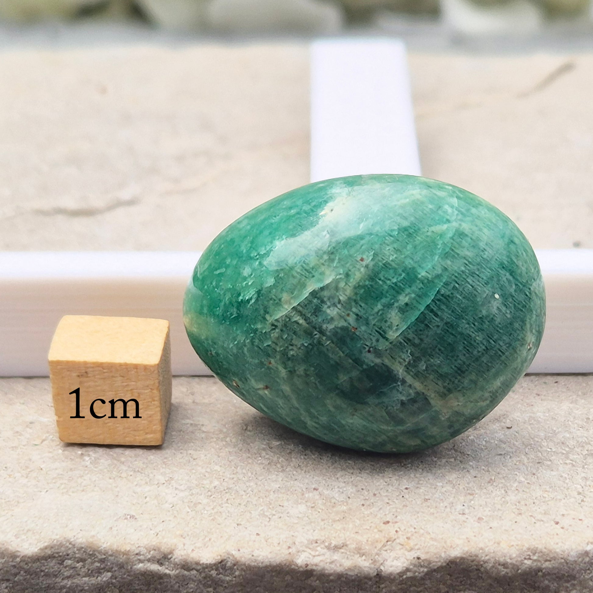 Polished Amazonite pebble shaped crystal with calming, balanced energy. Ideal for easing stress, open communication, and supportive everyday use.
