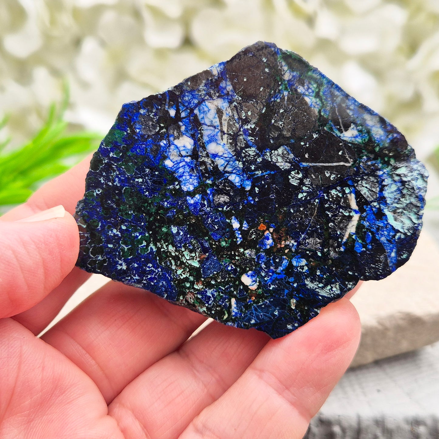 Natural Azurite crystal slice with vivid deep blue colouring and striking mineral patterns. A beautiful stone linked with intuition and awareness.