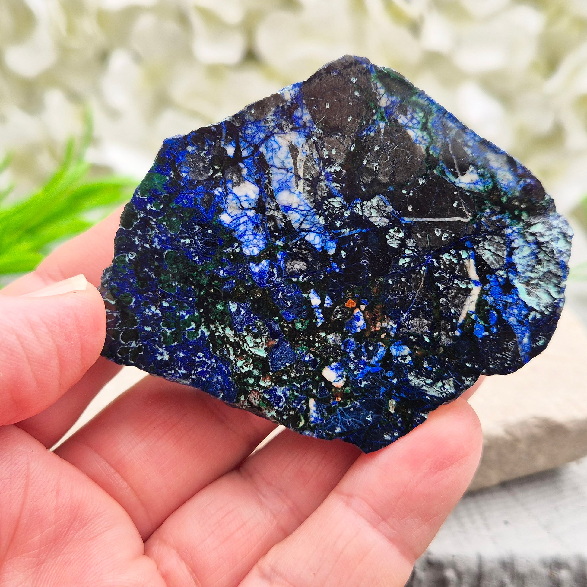 Natural Azurite crystal slice with vivid deep blue colouring and striking mineral patterns. A beautiful stone linked with intuition and awareness.