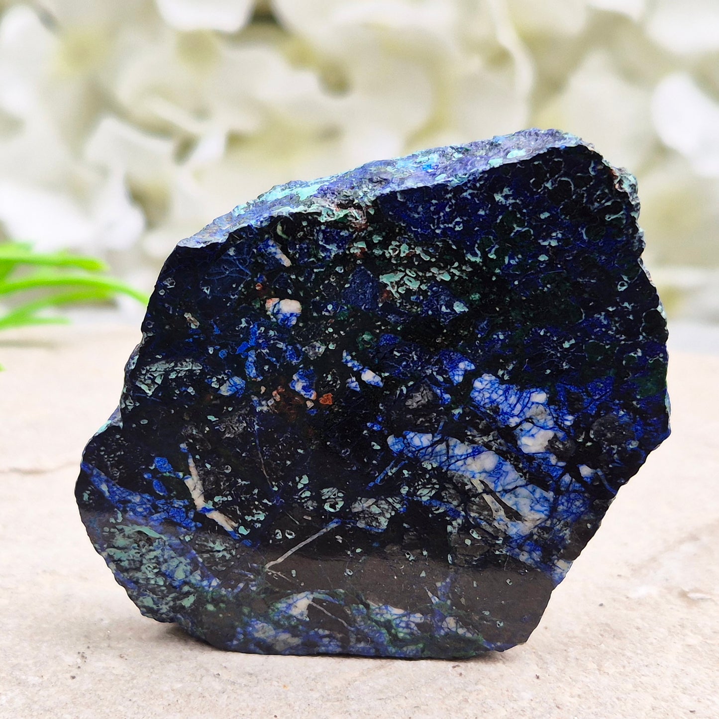 Natural Azurite crystal slice with vivid deep blue colouring and striking mineral patterns. A beautiful stone linked with intuition and awareness.