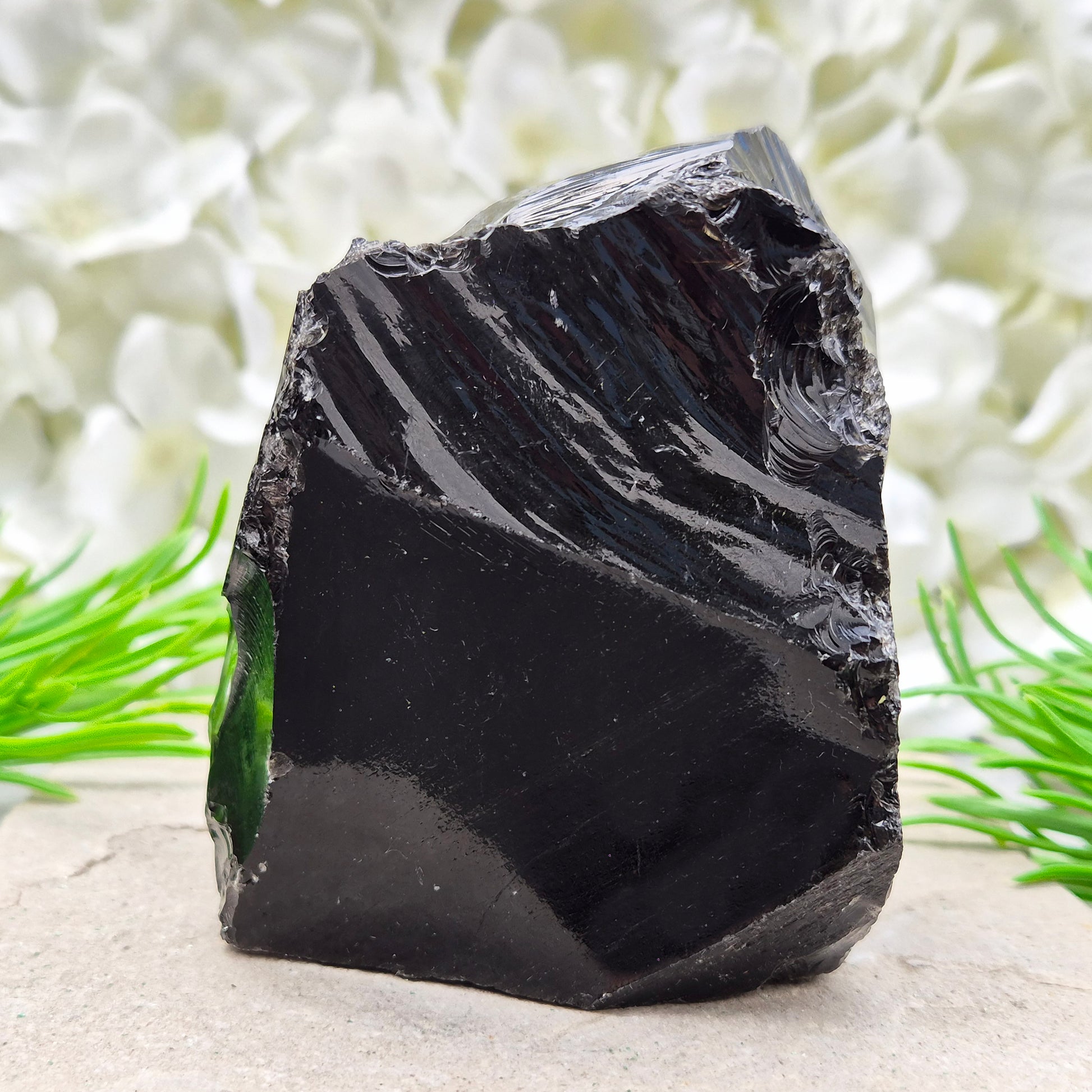 Natural black obsidian freeform from Mexico, known for its grounding presence and protective energy. A striking volcanic glass piece.