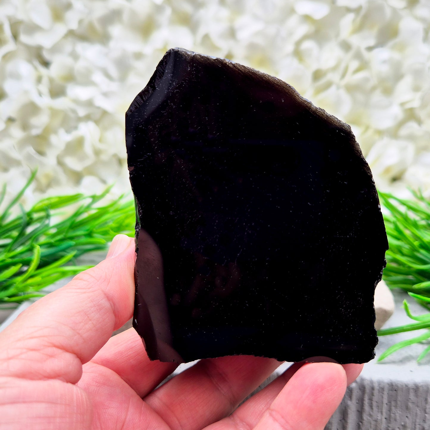Natural black obsidian freeform from Mexico, known for its grounding presence and protective energy. A striking volcanic glass piece.