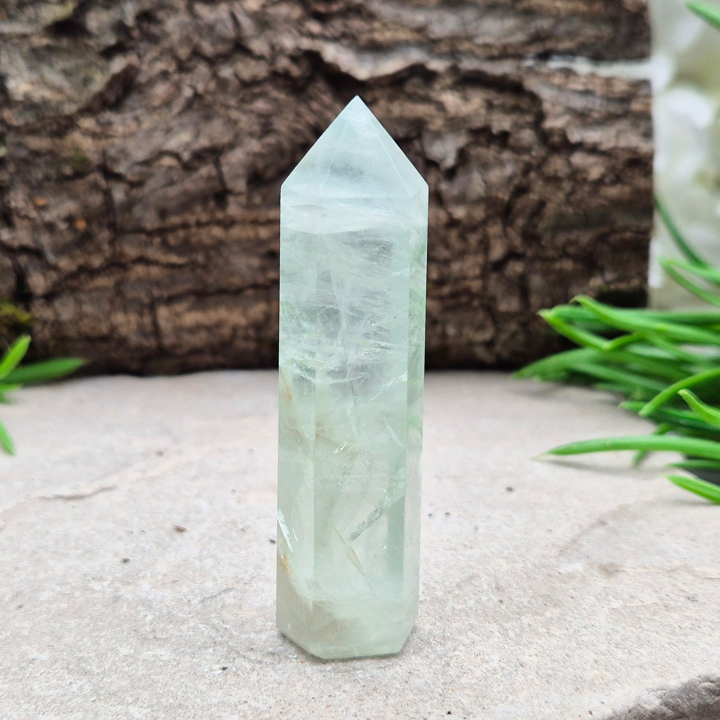 Natural Green Fluorite tower with six-sided generator tip. Supports focus, balance, and mental clarity. A calming crystal for your space or collection. UK home decor.