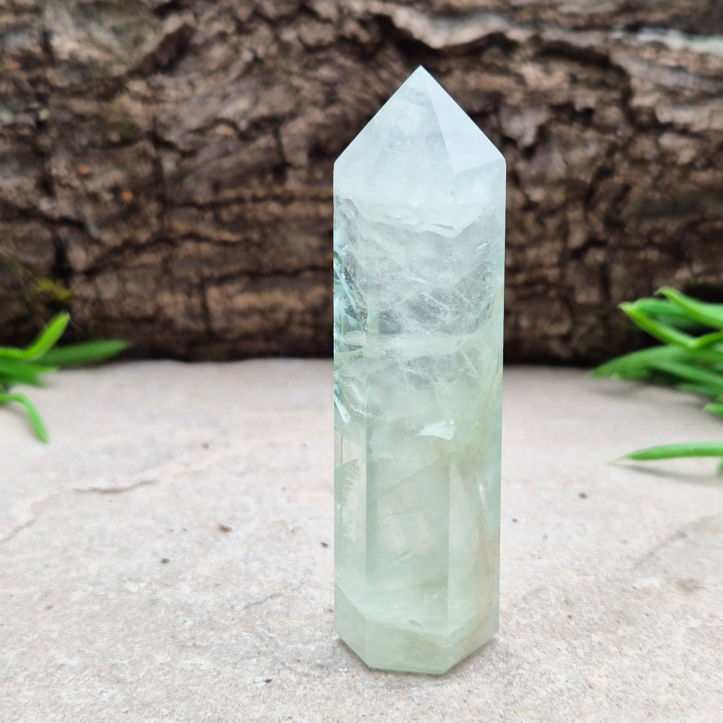 Natural Green Fluorite tower with six-sided generator tip. Supports focus, balance, and mental clarity. A calming crystal for your space or collection. UK home decor.