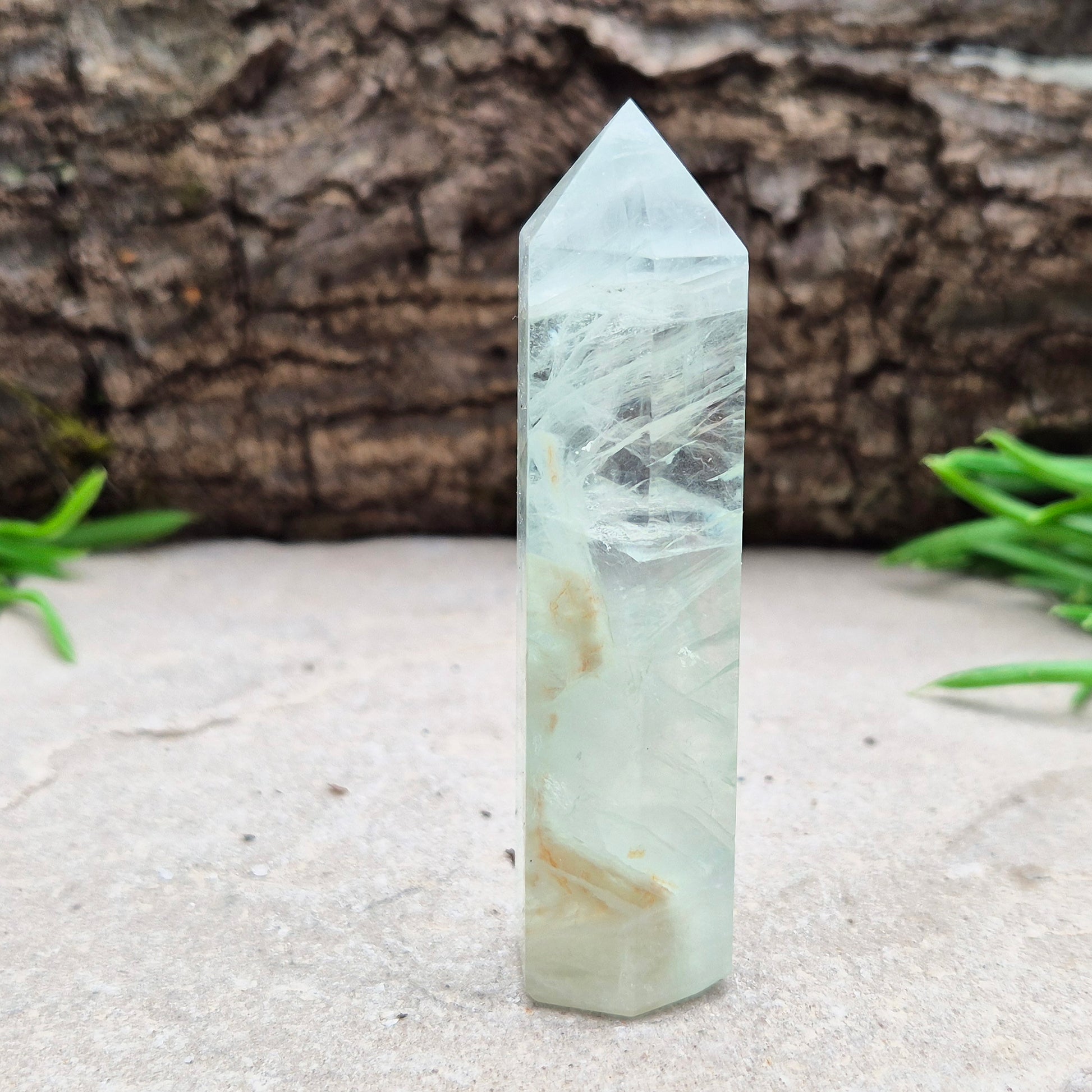 Natural Green Fluorite tower with six-sided generator tip. Supports focus, balance, and mental clarity. A calming crystal for your space or collection. UK home decor.