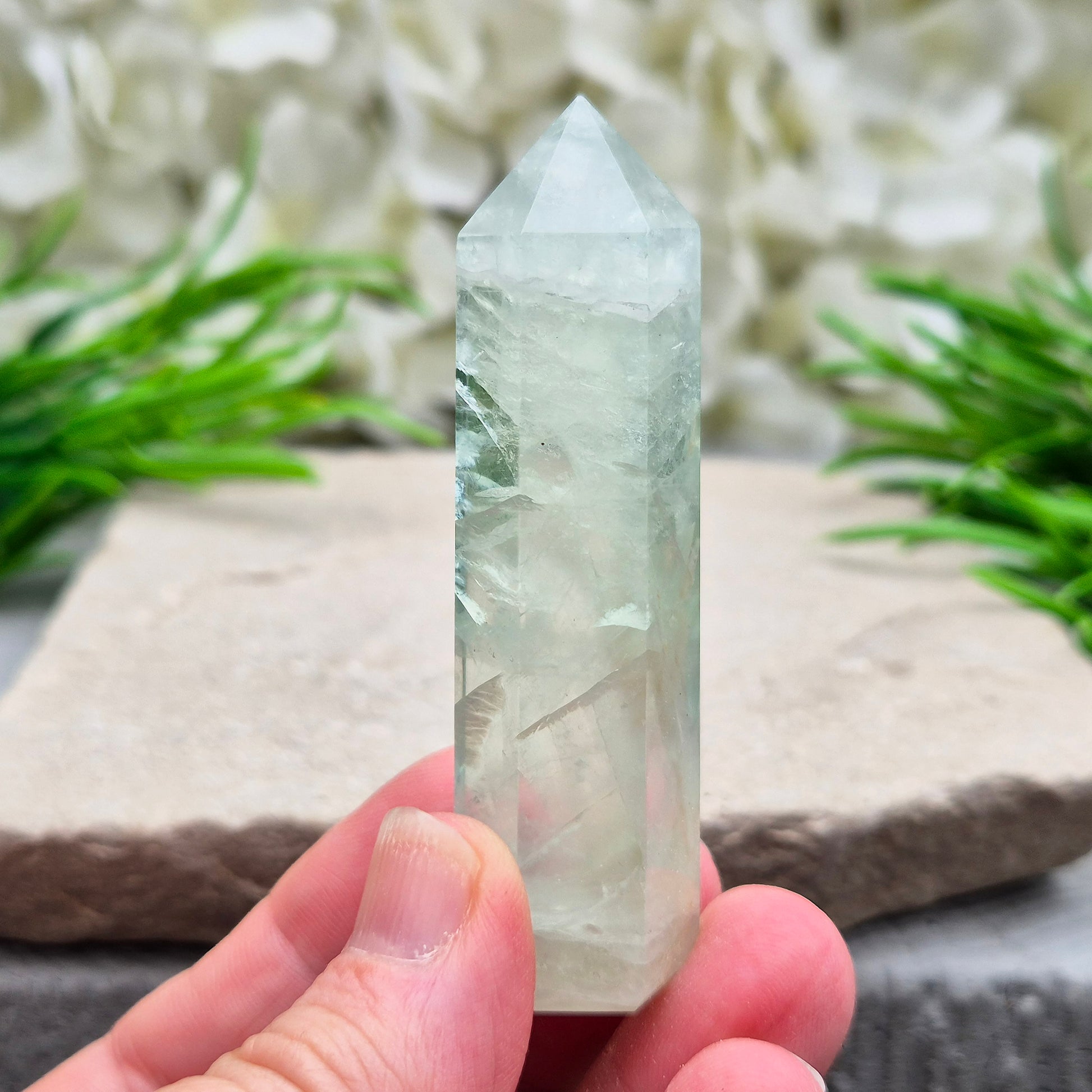 Natural Green Fluorite tower with six-sided generator tip. Supports focus, balance, and mental clarity. A calming crystal for your space or collection. UK home decor.