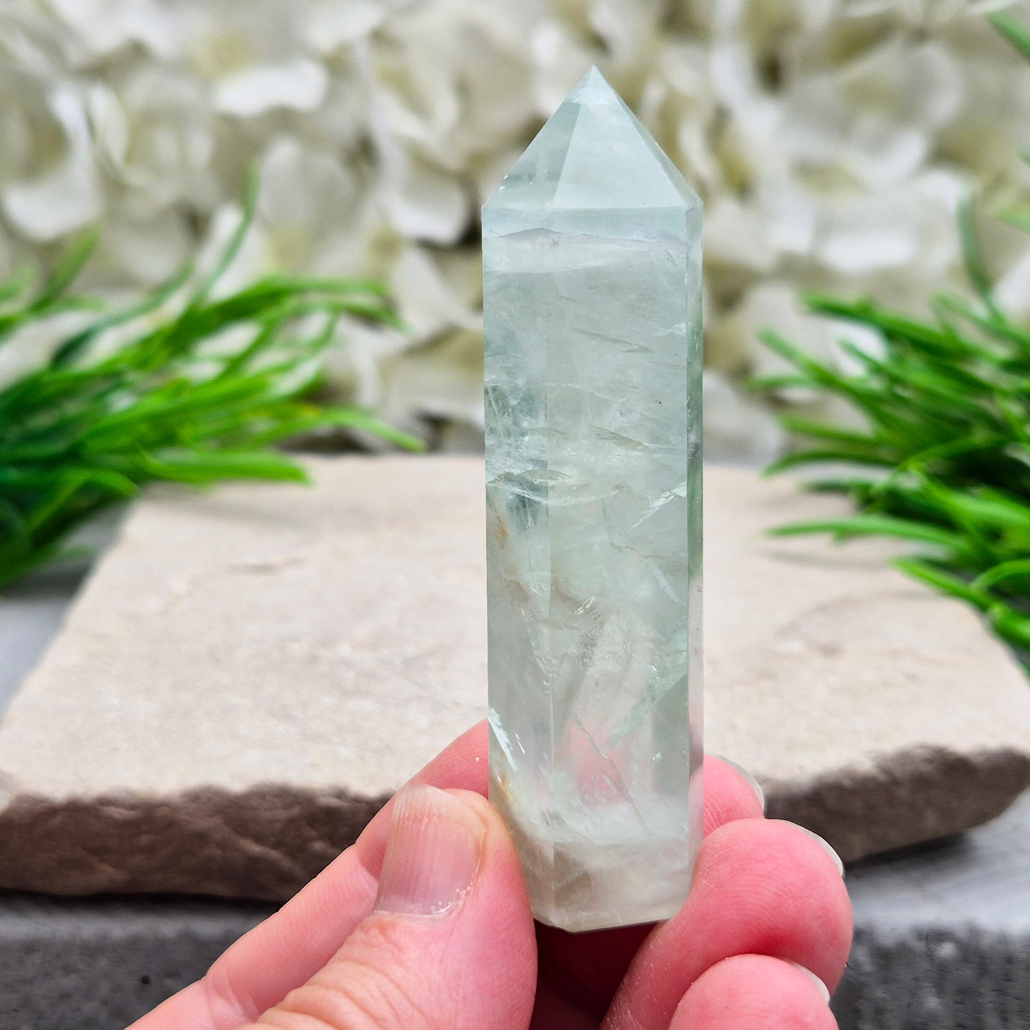 Natural Green Fluorite tower with six-sided generator tip. Supports focus, balance, and mental clarity. A calming crystal for your space or collection. UK home decor.