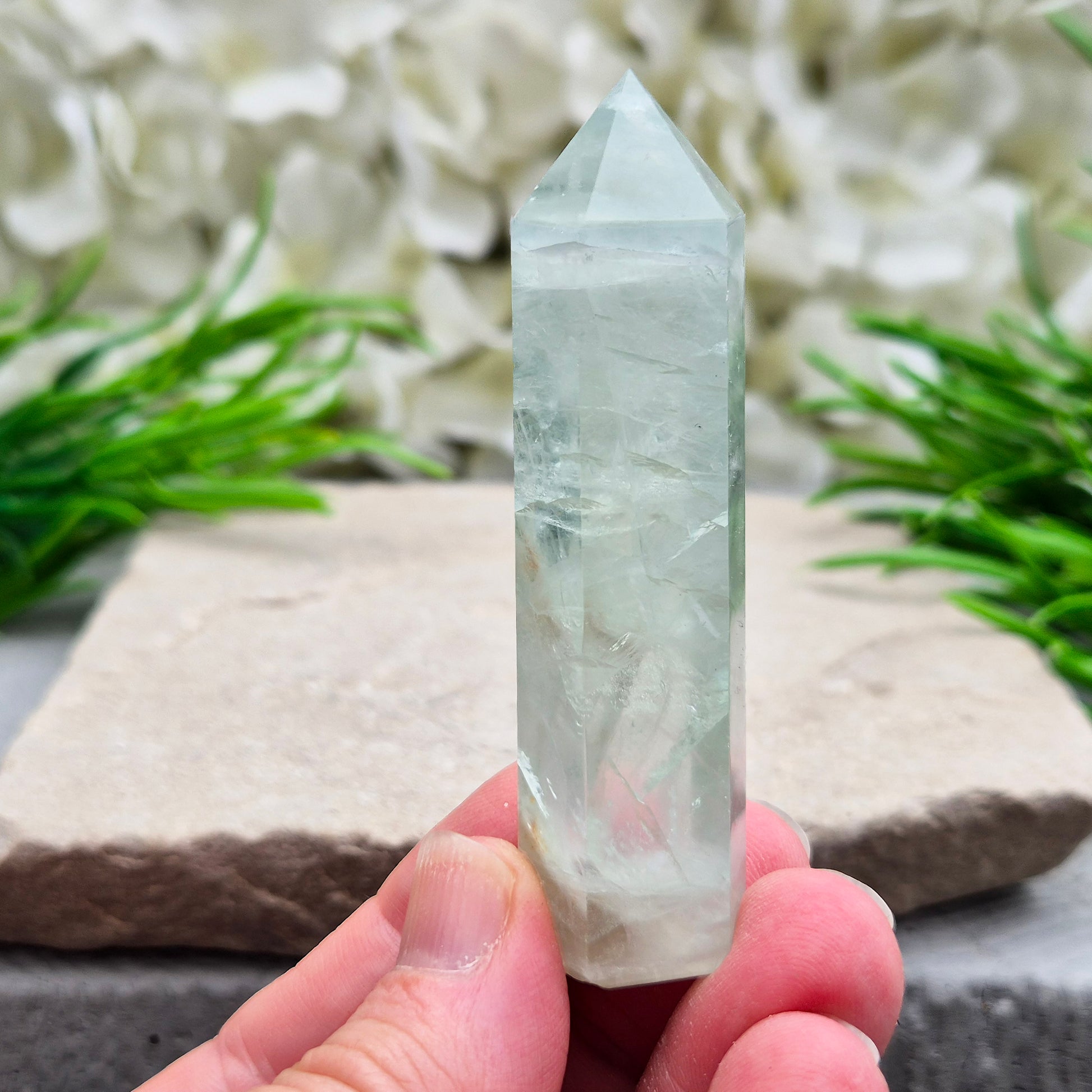 Natural Green Fluorite tower with six-sided generator tip. Supports focus, balance, and mental clarity. A calming crystal for your space or collection. UK home decor.