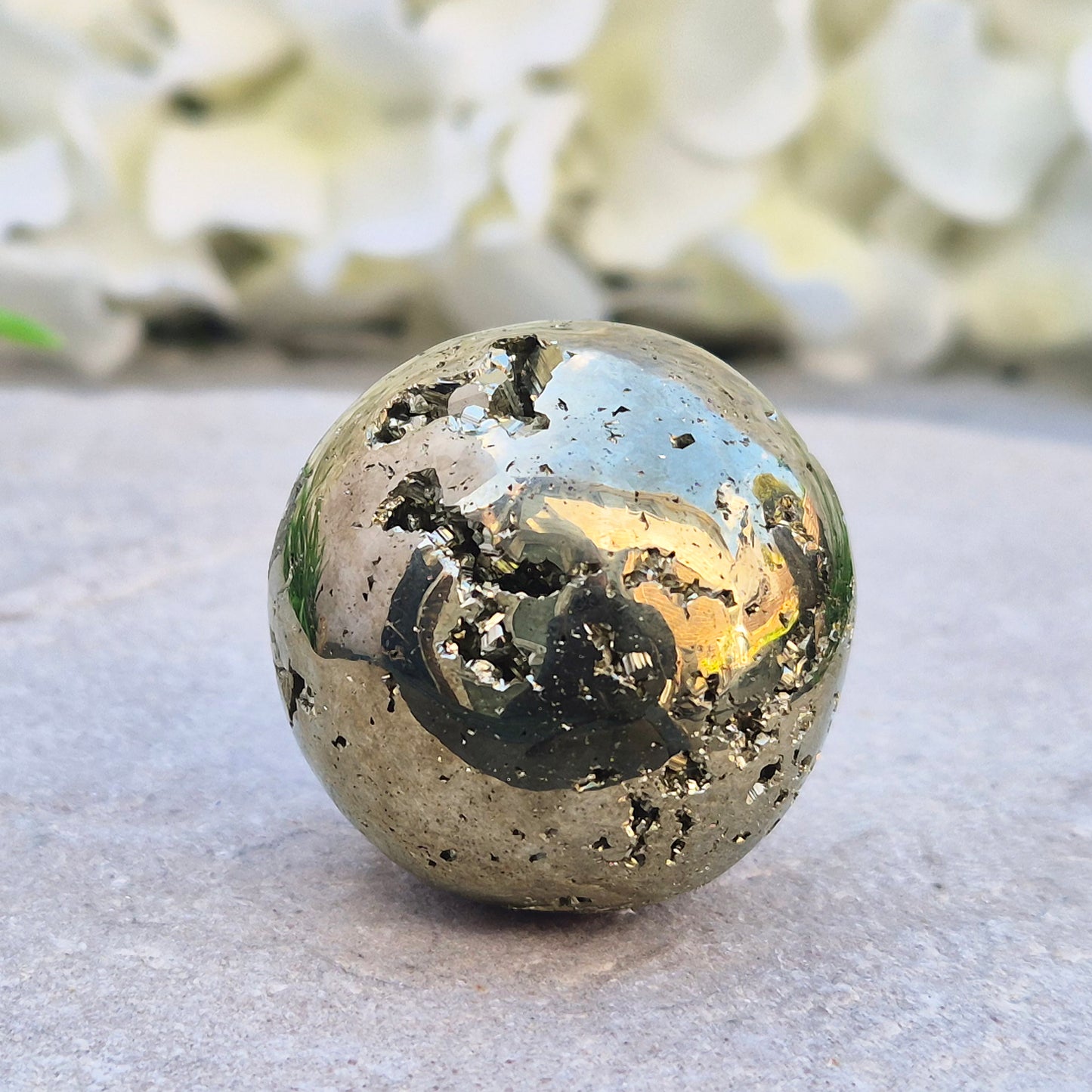 Shop genuine Pyrite crystal spheres from Peru. Known for confidence, motivation, protection, abundance, and energising workspace energy.