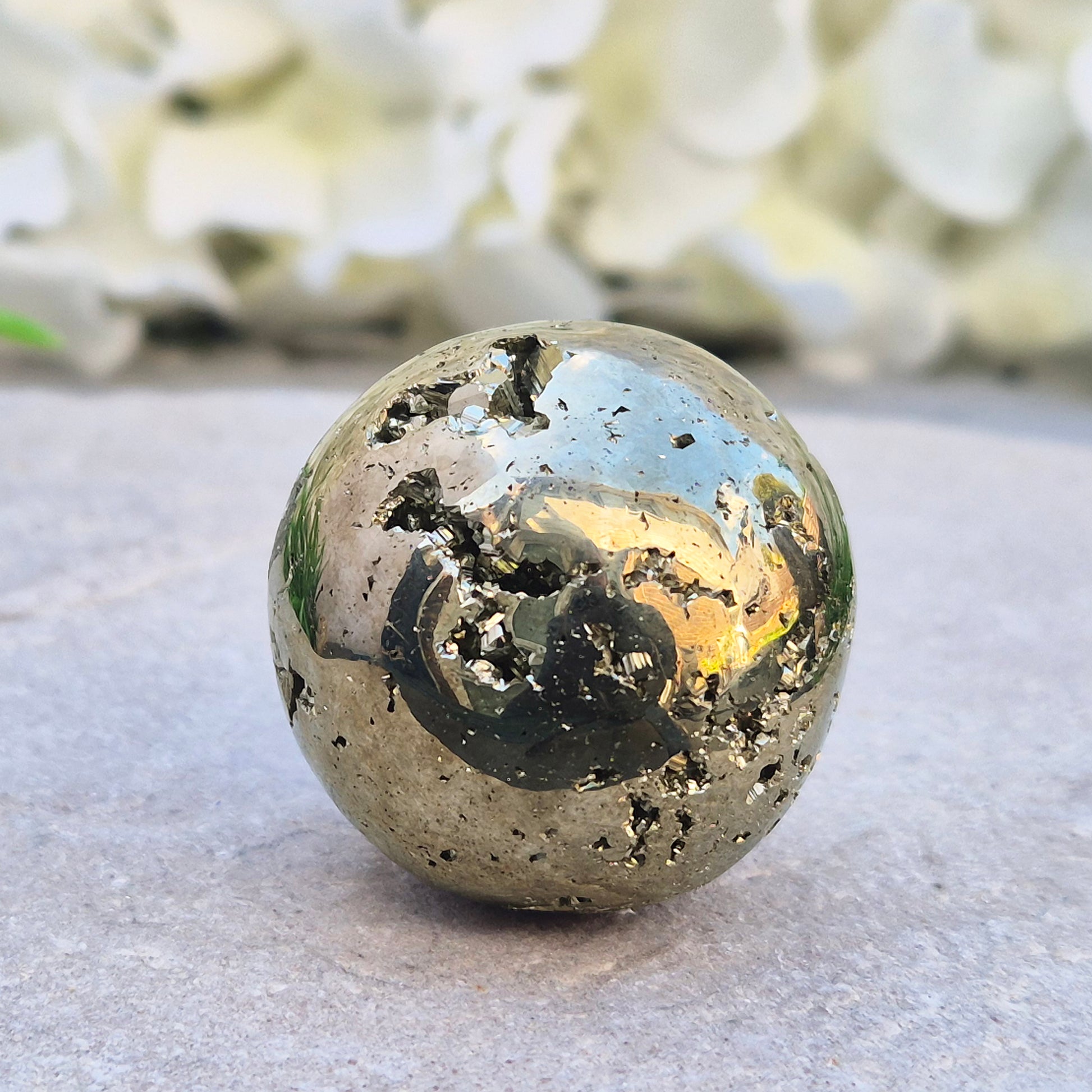 Shop genuine Pyrite crystal spheres from Peru. Known for confidence, motivation, protection, abundance, and energising workspace energy.