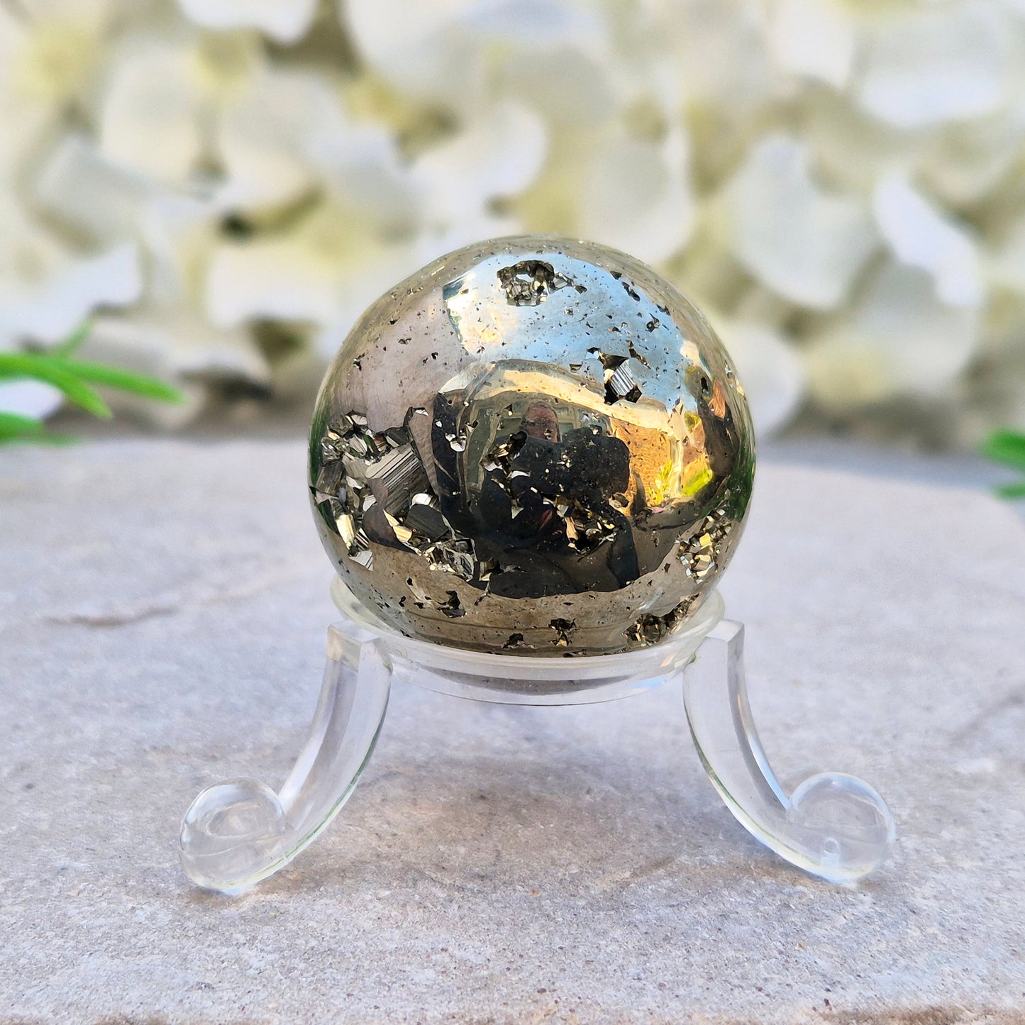 Shop genuine Pyrite crystal spheres from Peru. Known for confidence, motivation, protection, abundance, and energising workspace energy.