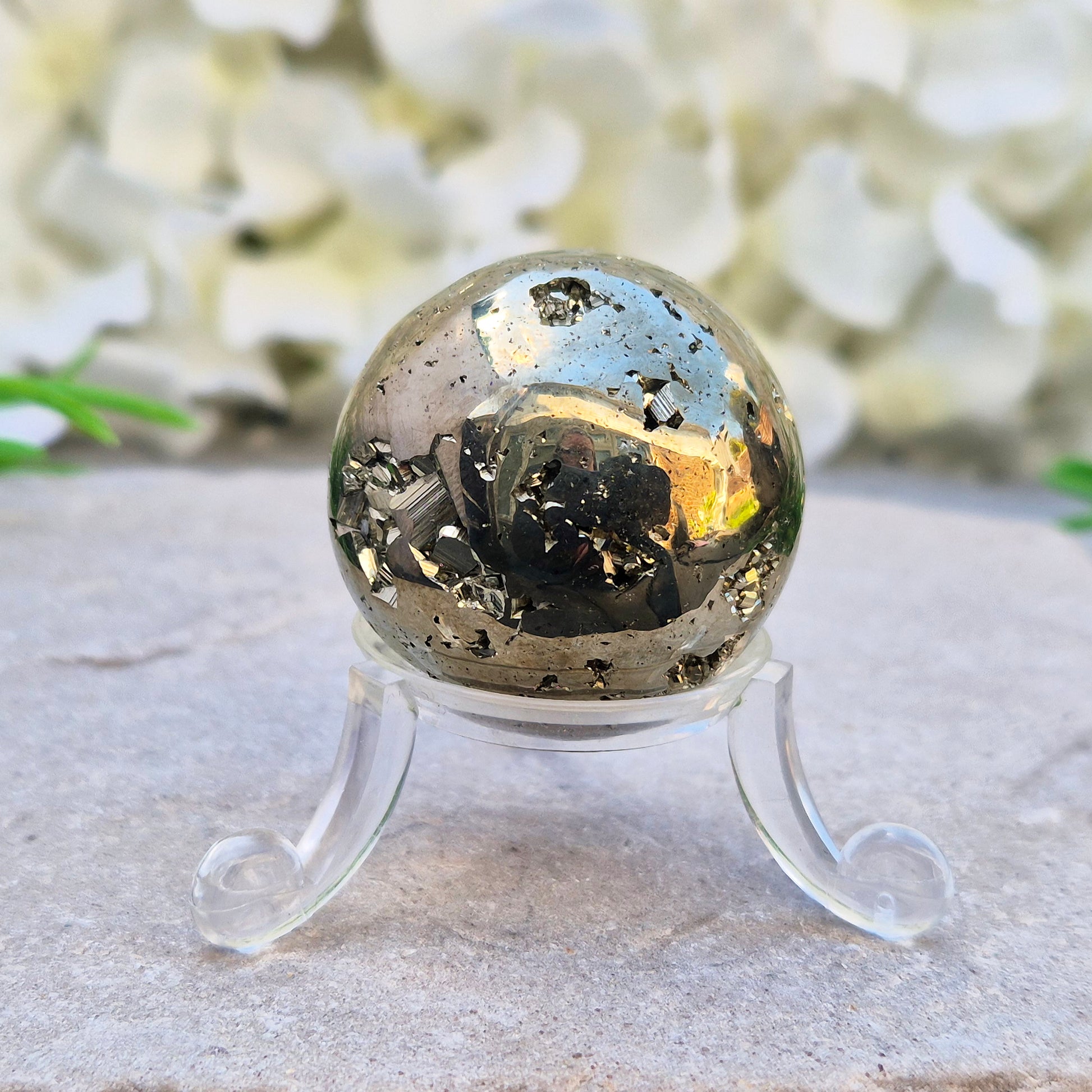 Shop genuine Pyrite crystal spheres from Peru. Known for confidence, motivation, protection, abundance, and energising workspace energy.