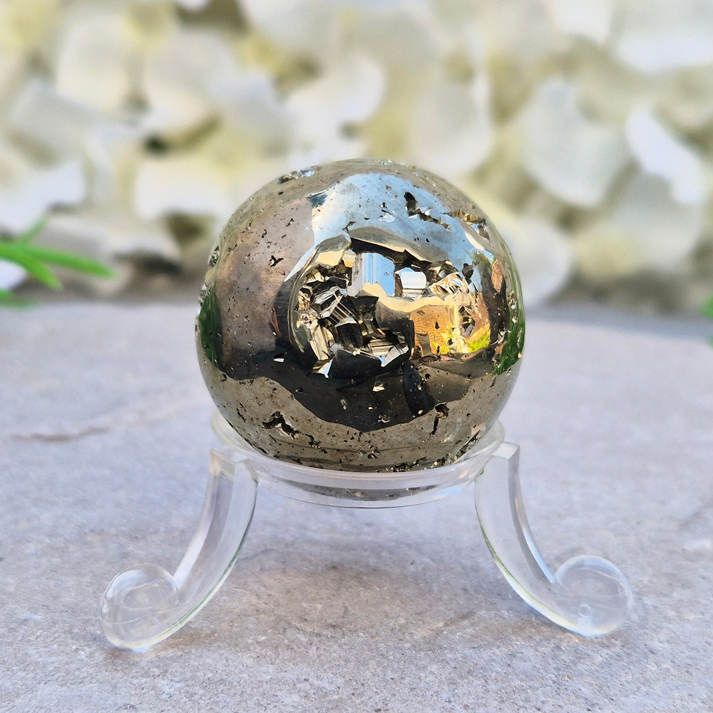 Shop genuine Pyrite crystal spheres from Peru. Known for confidence, motivation, protection, abundance, and energising workspace energy.