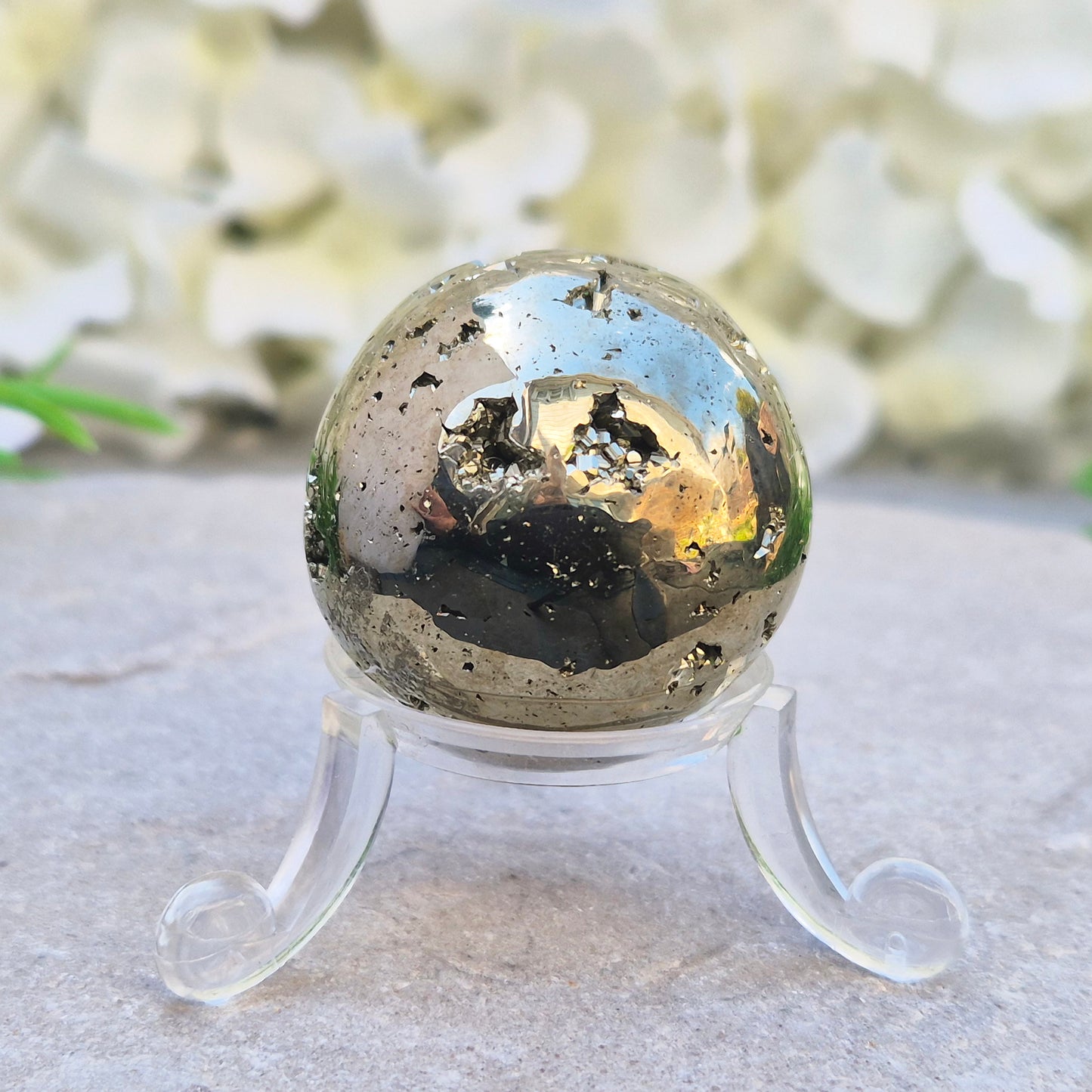 Shop genuine Pyrite crystal spheres from Peru. Known for confidence, motivation, protection, abundance, and energising workspace energy.
