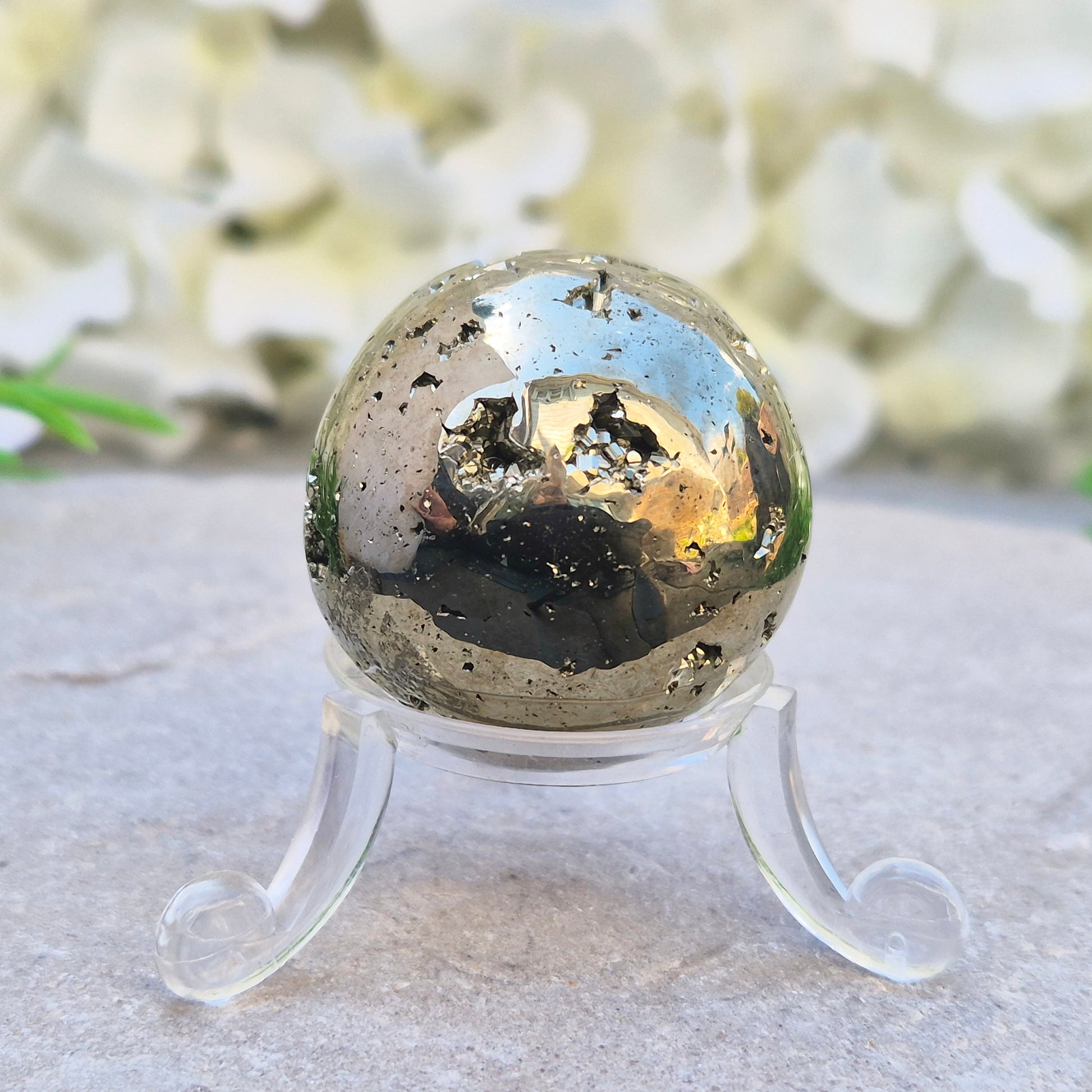Shop genuine Pyrite crystal spheres from Peru. Known for confidence, motivation, protection, abundance, and energising workspace energy.