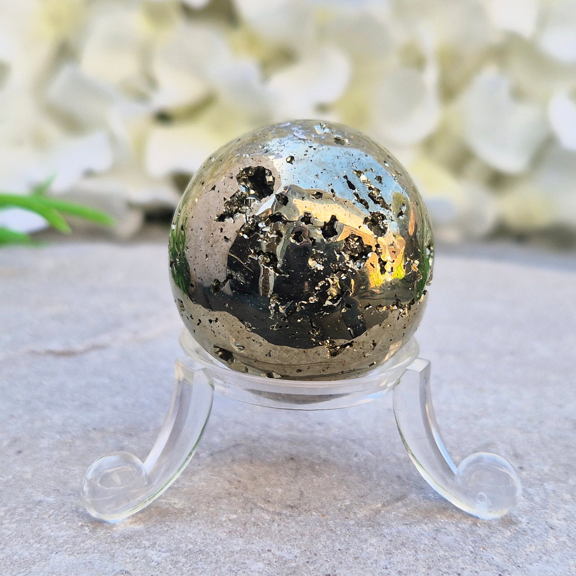 Shop genuine Pyrite crystal spheres from Peru. Known for confidence, motivation, protection, abundance, and energising workspace energy.