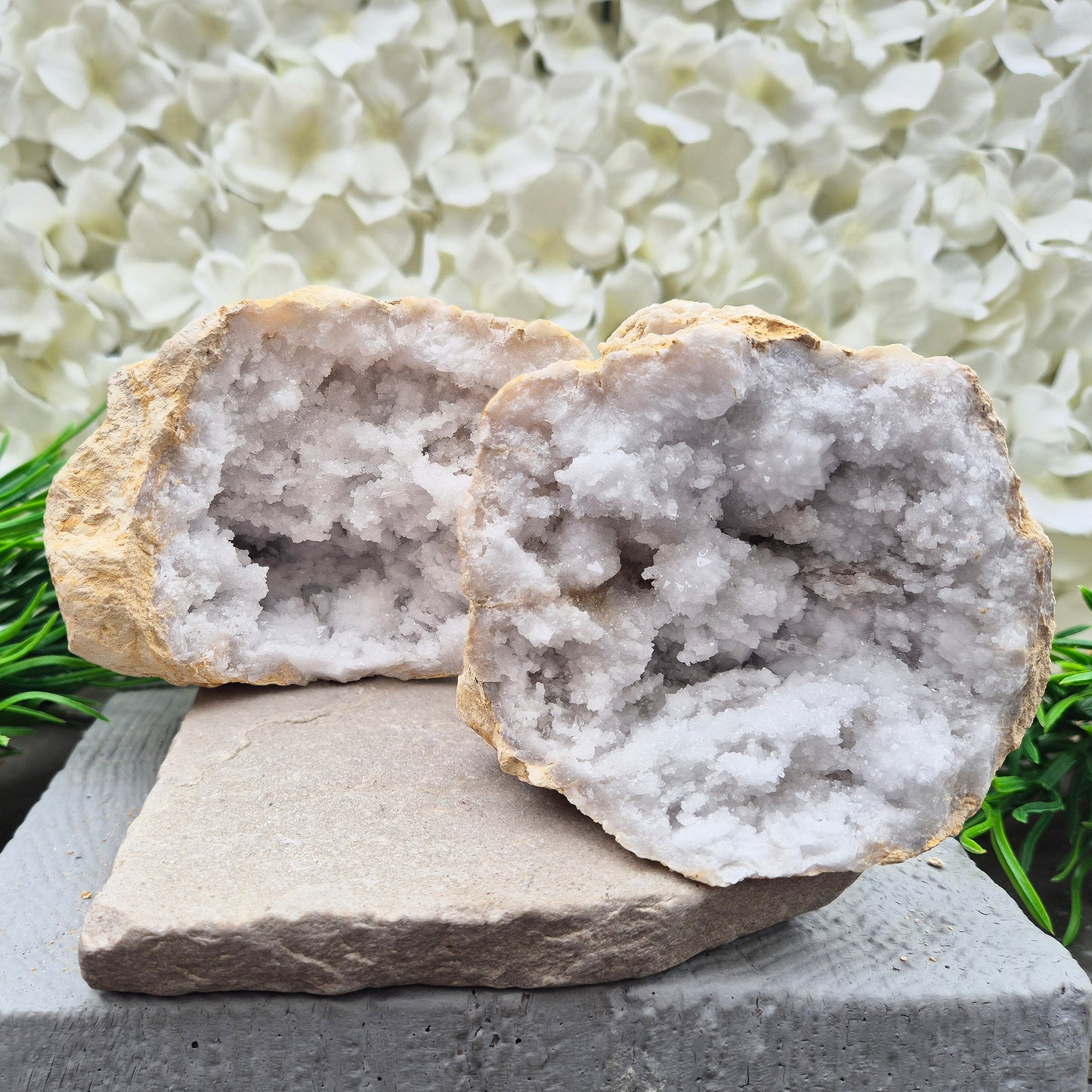 Quartz geode pair that brings a soothing, balanced atmosphere to any room. A lovely choice for home styling, meditation, and crystal lovers.