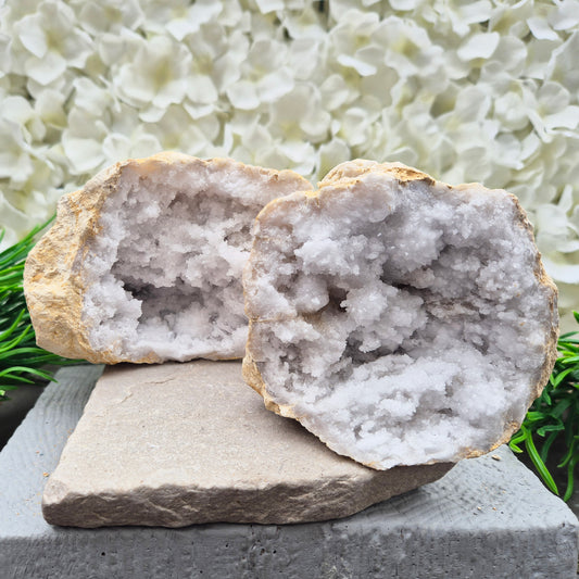 Quartz geode pair that brings a soothing, balanced atmosphere to any room. A lovely choice for home styling, meditation, and crystal lovers.