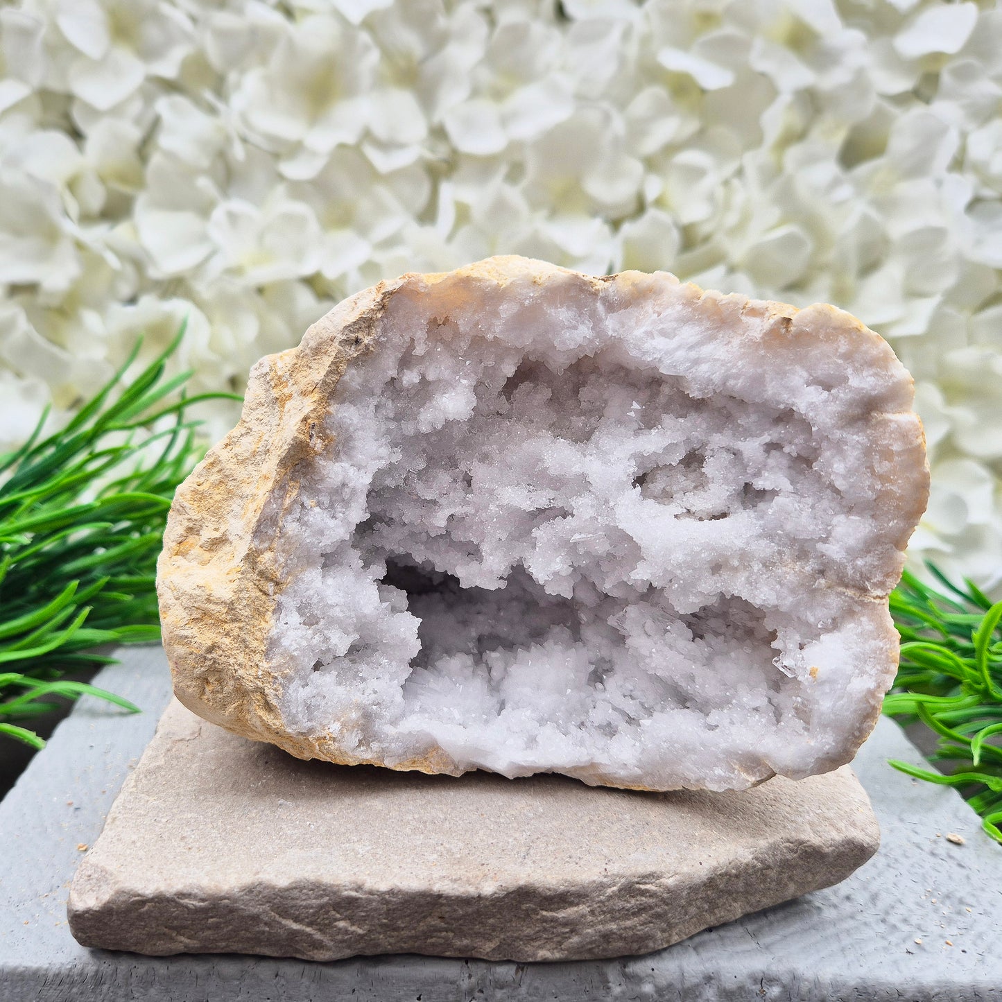 Quartz geode pair that brings a soothing, balanced atmosphere to any room. A lovely choice for home styling, meditation, and crystal lovers.