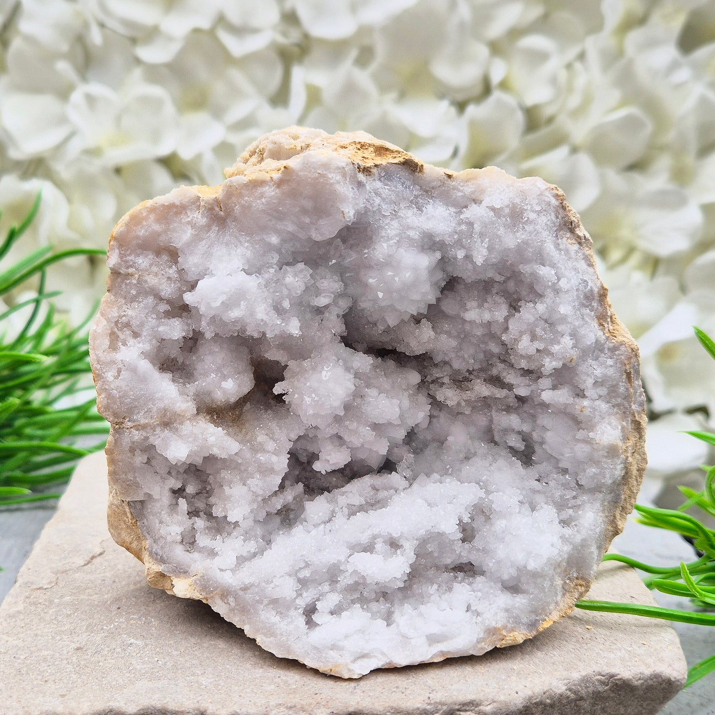 Quartz geode pair that brings a soothing, balanced atmosphere to any room. A lovely choice for home styling, meditation, and crystal lovers.