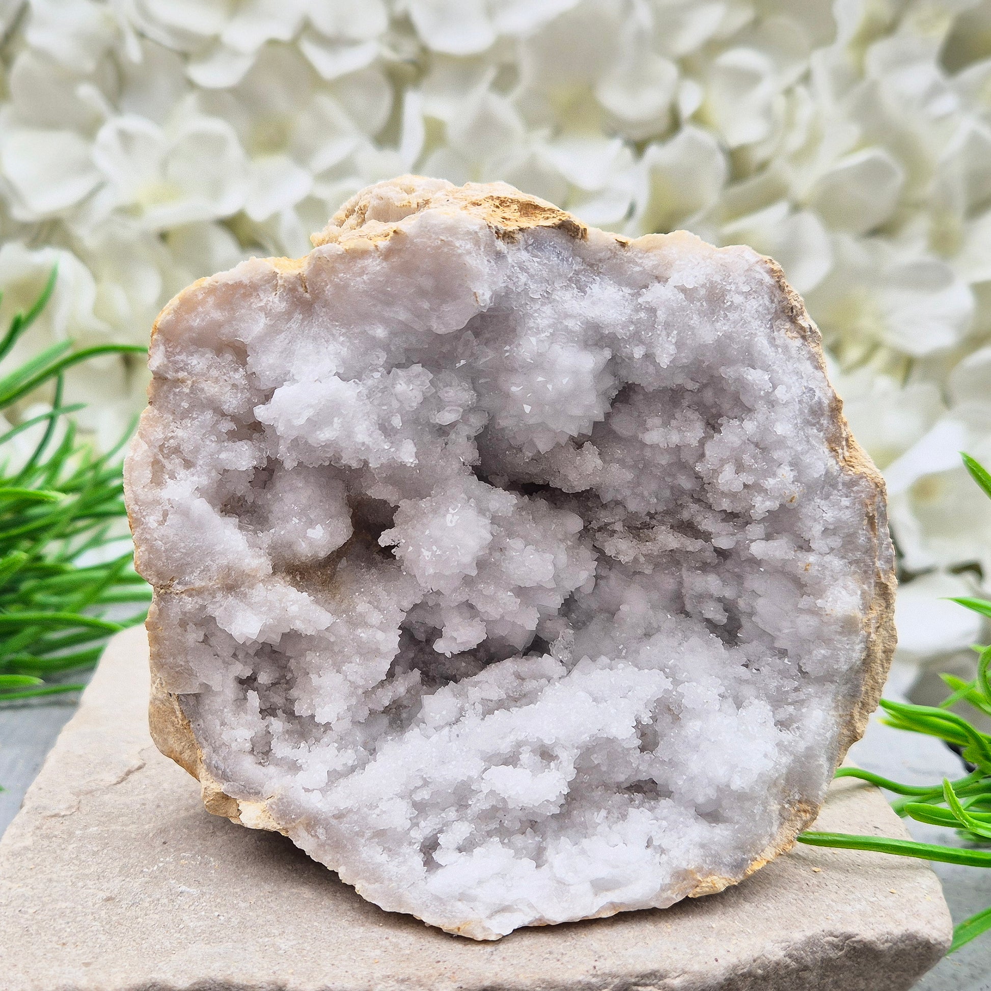 Quartz geode pair that brings a soothing, balanced atmosphere to any room. A lovely choice for home styling, meditation, and crystal lovers.