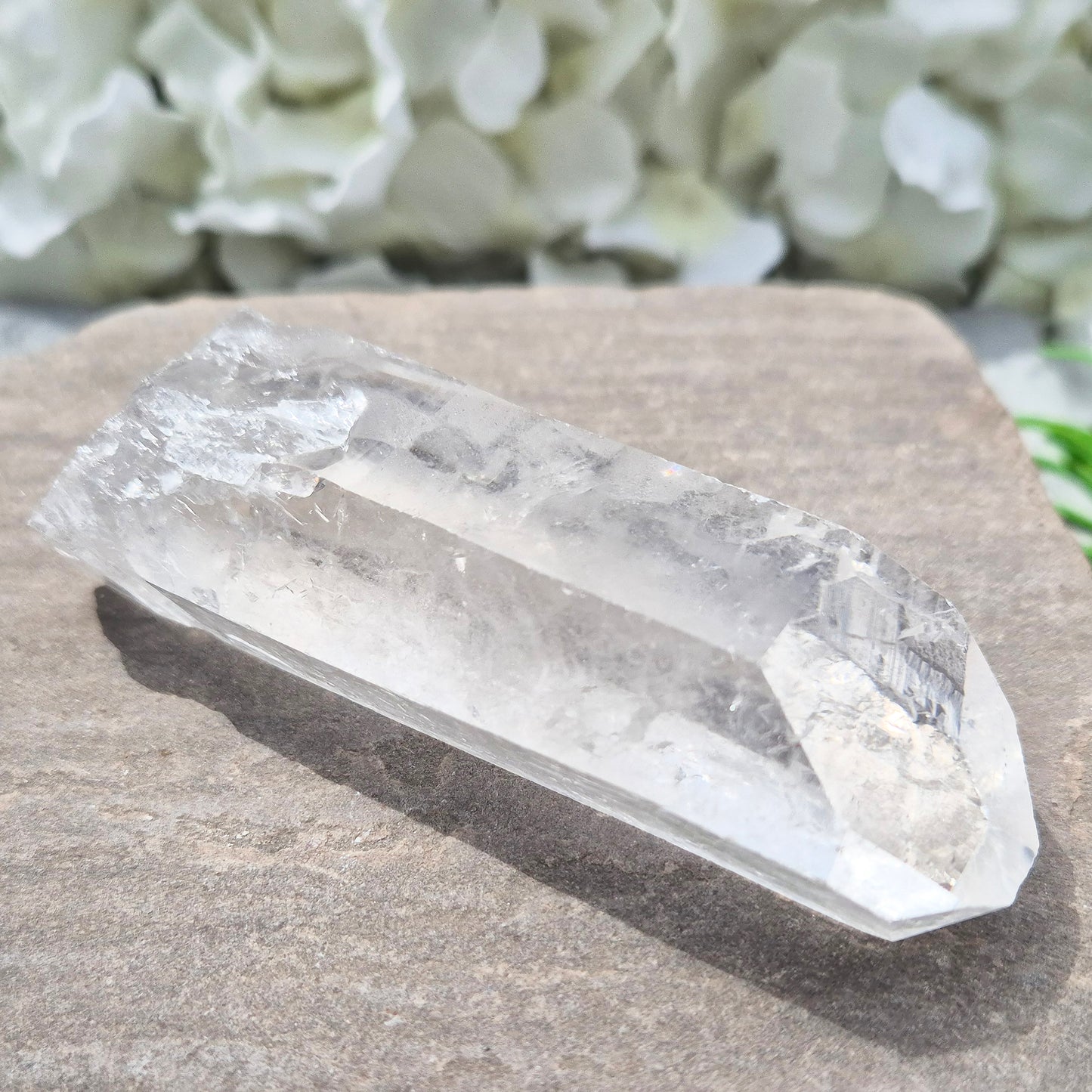 Natural Quartz Crystal Point from Brazil. Clear, natural quartz for focus, balance and energy work. Ideal for meditation, grids and crystal collections.
