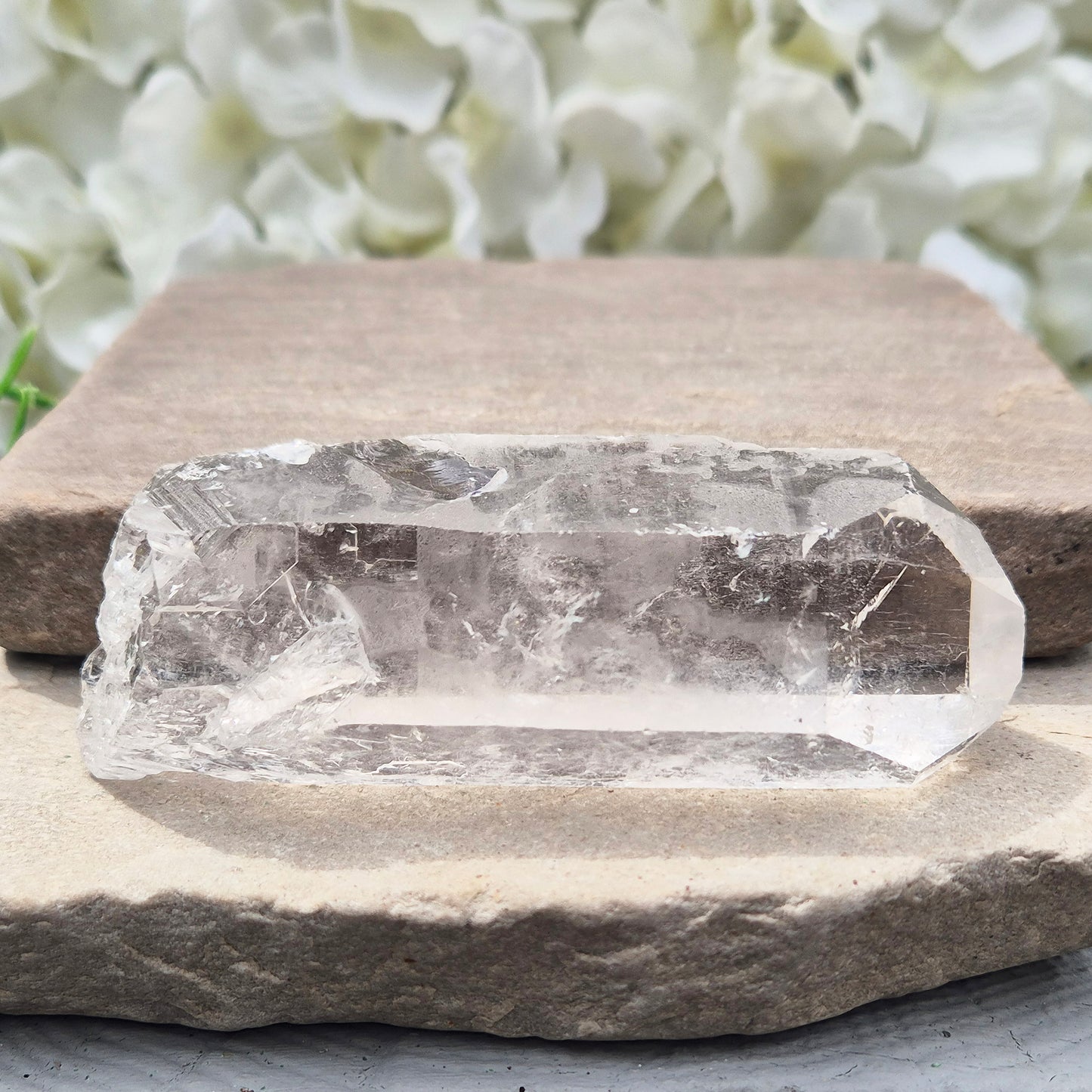 Natural Quartz Crystal Point from Brazil. Clear, natural quartz for focus, balance and energy work. Ideal for meditation, grids and crystal collections.
