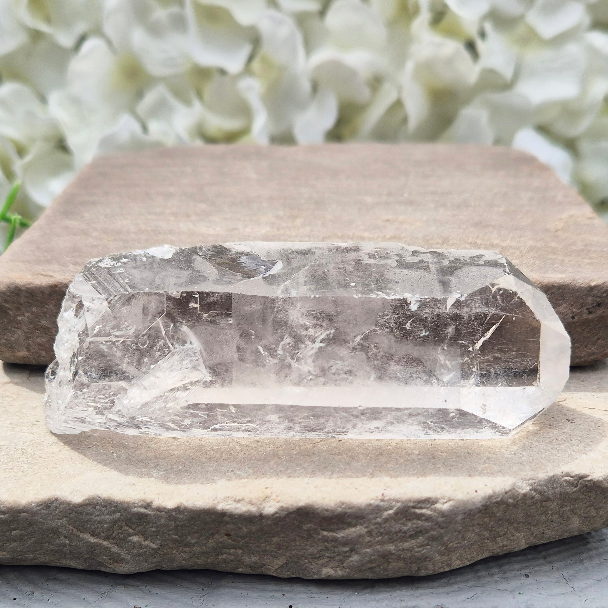 Natural Quartz Crystal Point from Brazil. Clear, natural quartz for focus, balance and energy work. Ideal for meditation, grids and crystal collections.