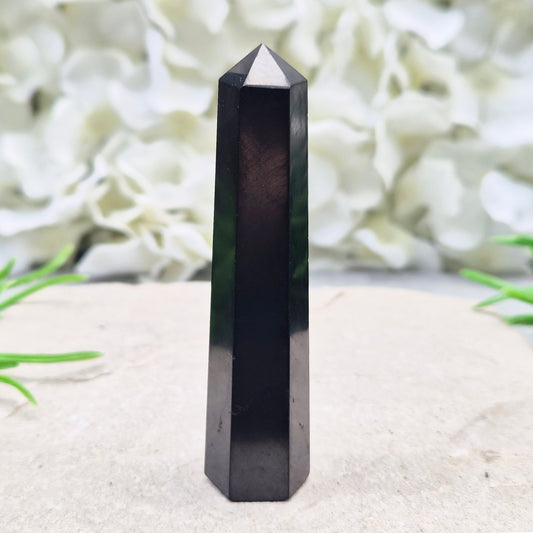Polished Shungite Crystal Tower from Karelia, Russia. A grounding and protective crystal point ideal for meditation, energy work, and calm spaces.