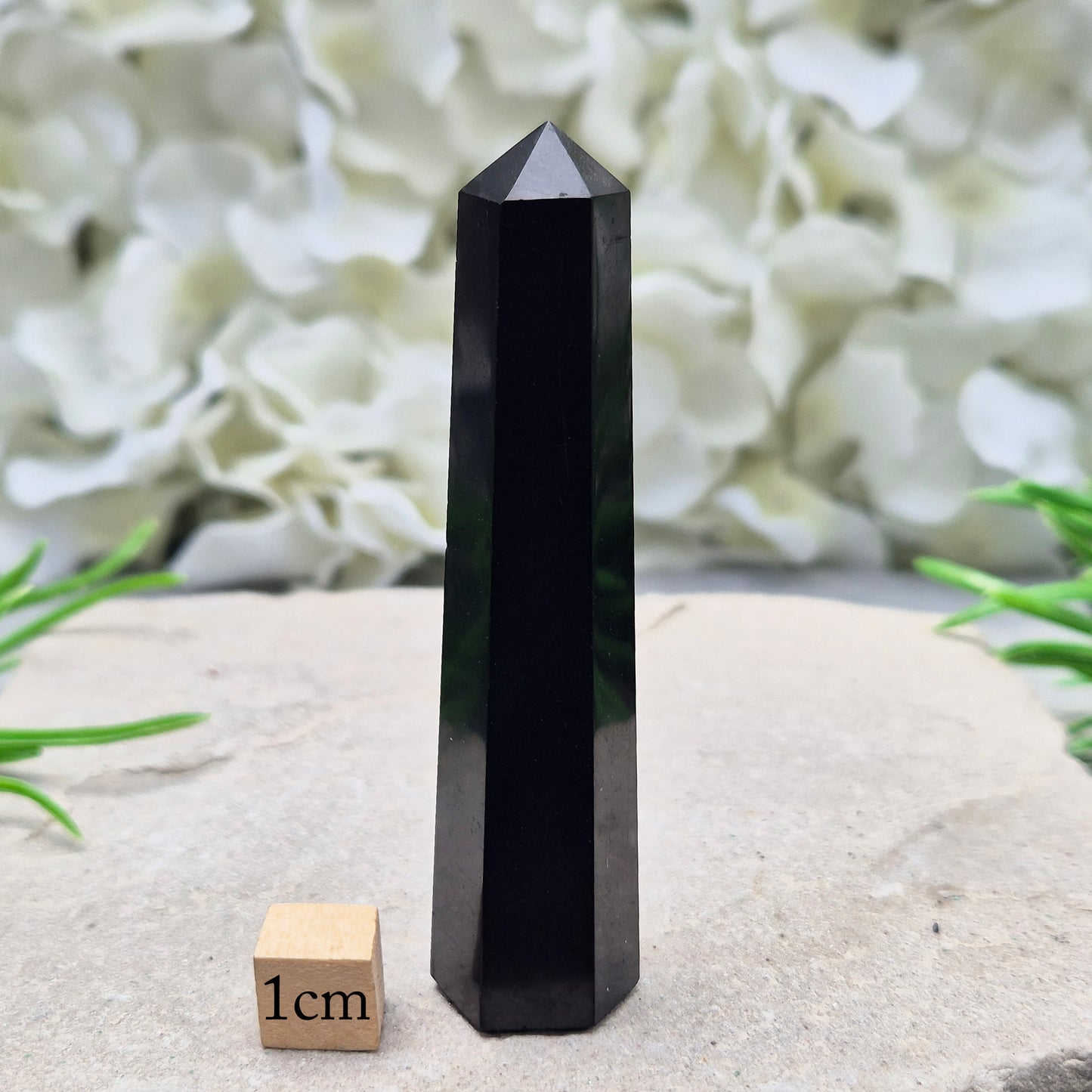 Polished Shungite Crystal Tower from Karelia, Russia. A grounding and protective crystal point ideal for meditation, energy work, and calm spaces.