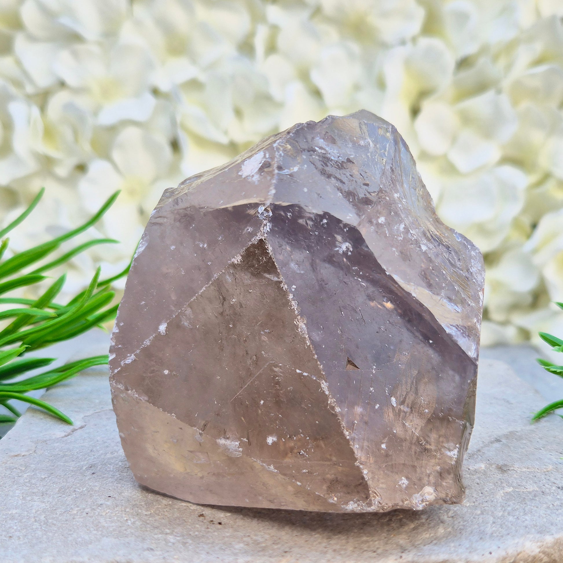 Smoky Quartz freeform from Brazil with polished face and natural sides. A grounding crystal for protection, calm focus, and emotional release.