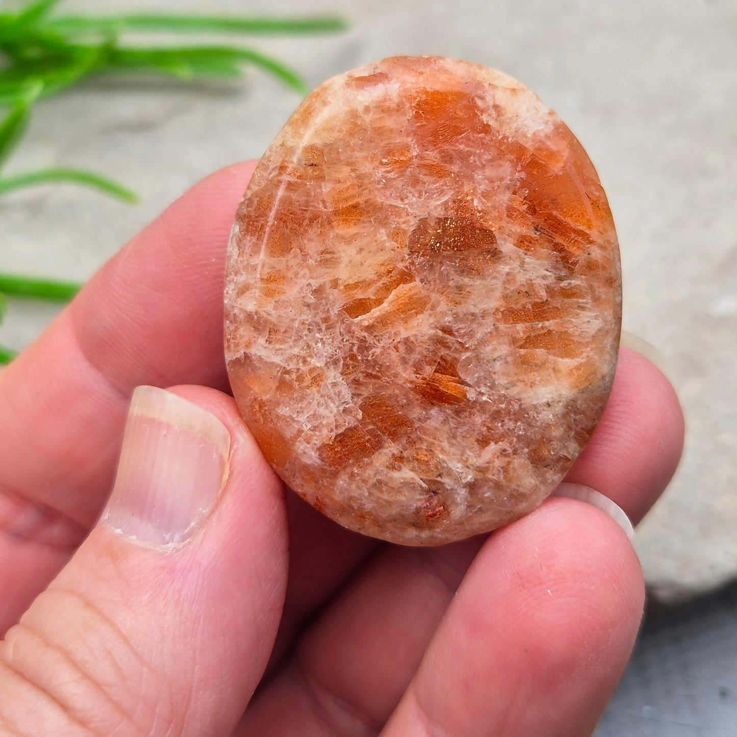 Sunstone Palm Stone – crystal of joy, vitality and confidence. Smooth and polished for meditation, energy work, or carrying uplifting energy with you.