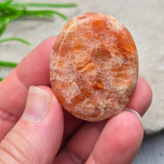 Sunstone Palm Stone – crystal of joy, vitality and confidence. Smooth and polished for meditation, energy work, or carrying uplifting energy with you.