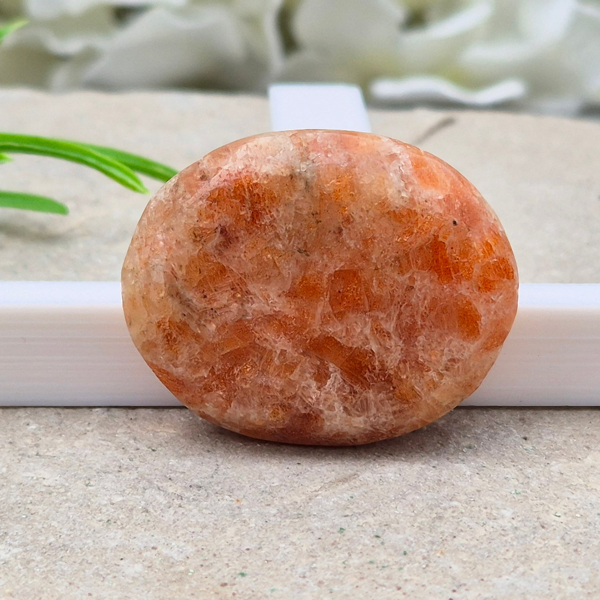 Sunstone Palm Stone – crystal of joy, vitality and confidence. Smooth and polished for meditation, energy work, or carrying uplifting energy with you.