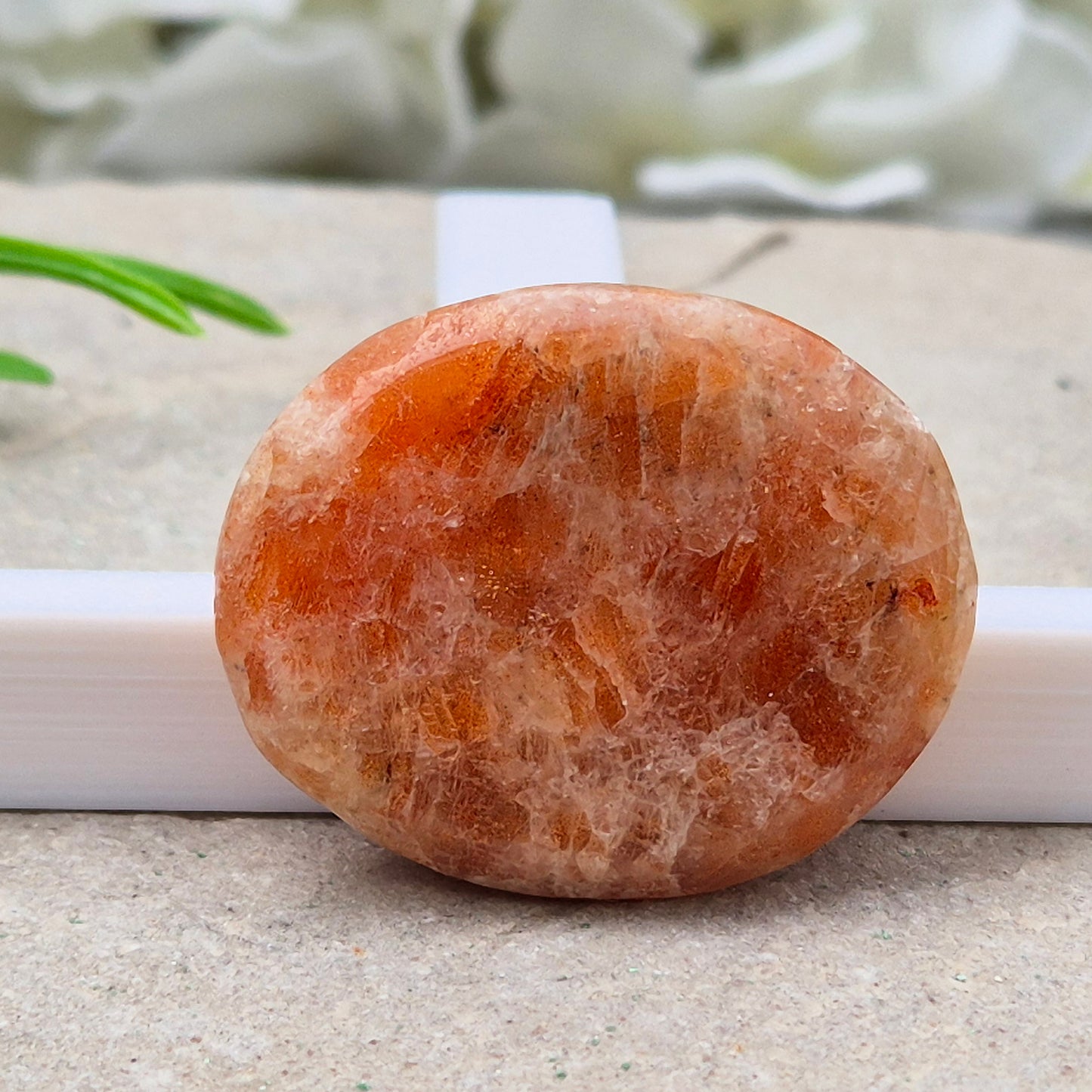 Sunstone Palm Stone – crystal of joy, vitality and confidence. Smooth and polished for meditation, energy work, or carrying uplifting energy with you.