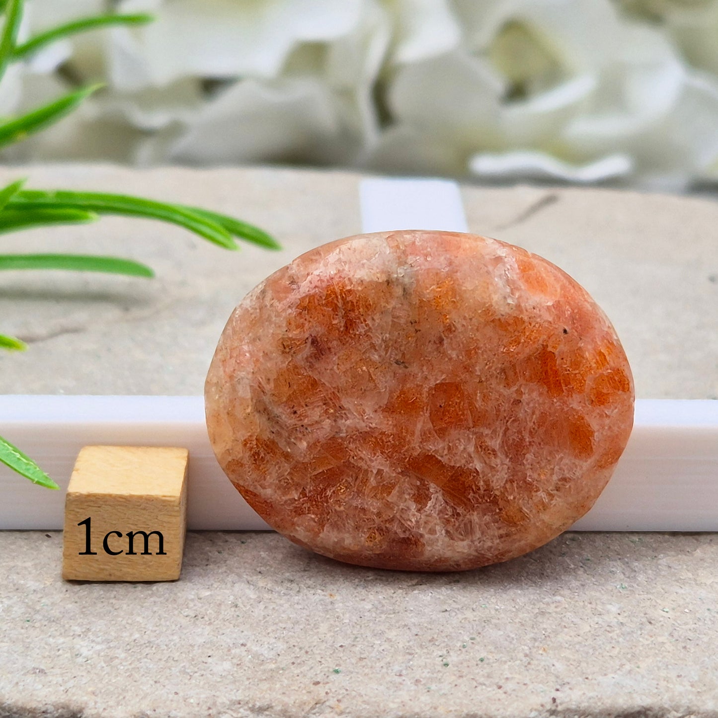Sunstone Palm Stone – crystal of joy, vitality and confidence. Smooth and polished for meditation, energy work, or carrying uplifting energy with you.
