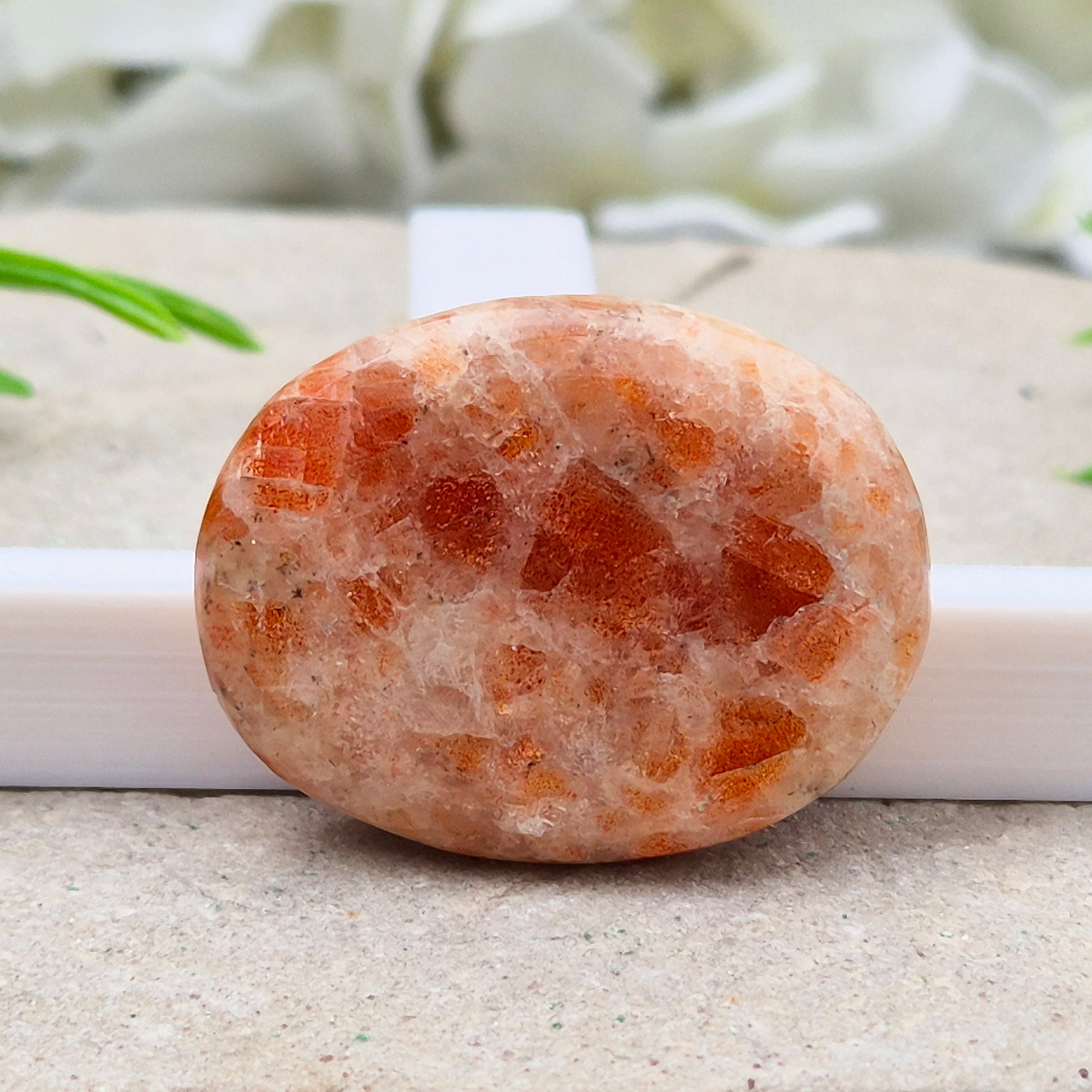 Sunstone Palm Stone – crystal of joy, vitality and confidence. Smooth and polished for meditation, energy work, or carrying uplifting energy with you.